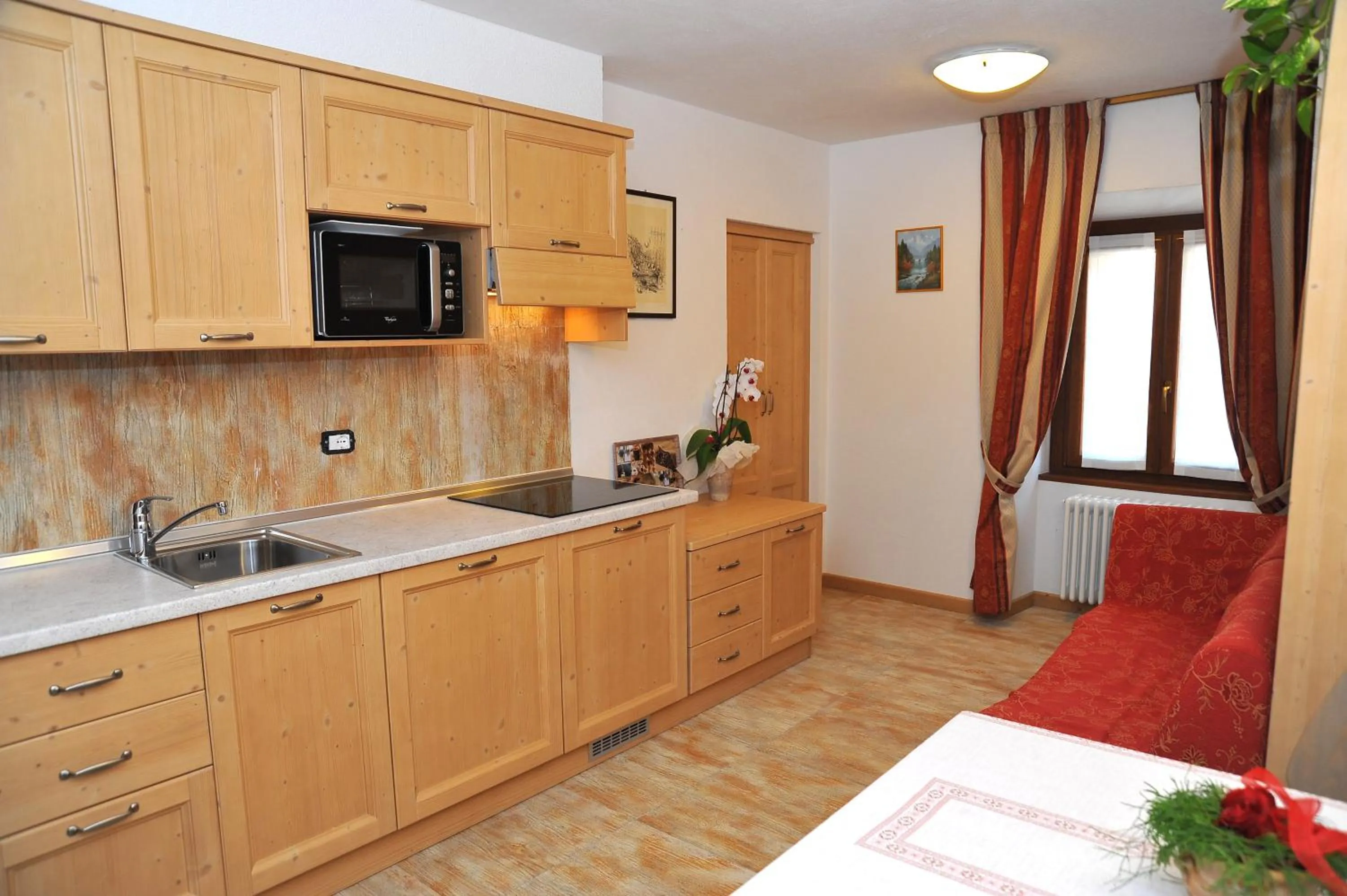 Kitchen or kitchenette in Albergo Stelvio