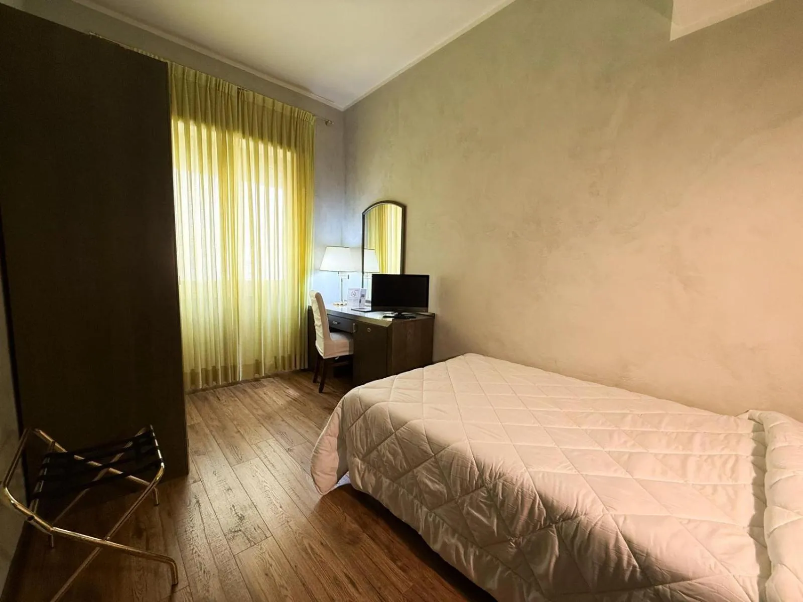 Bed in Astor Hotel Vintage