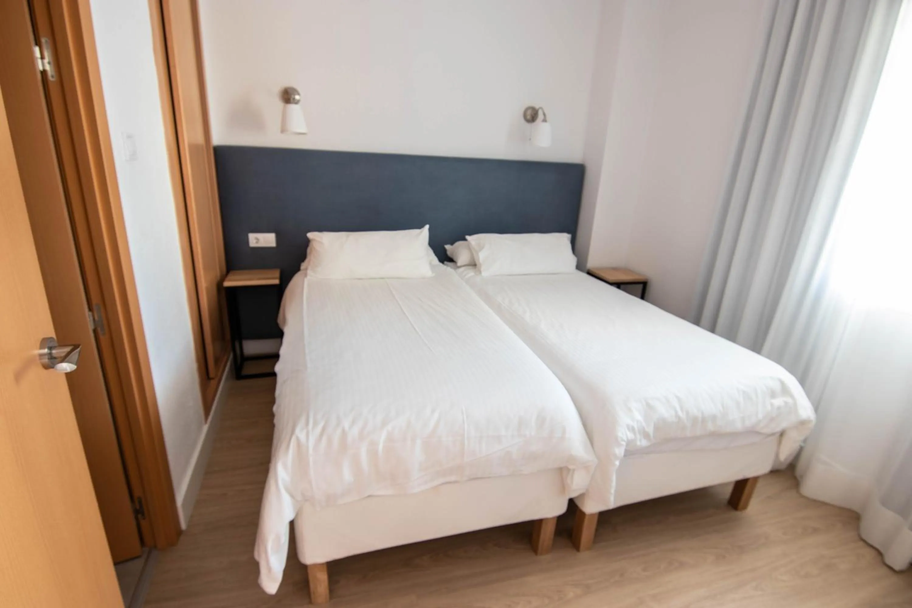 Bedroom, Bed in Apartamentos Buensol