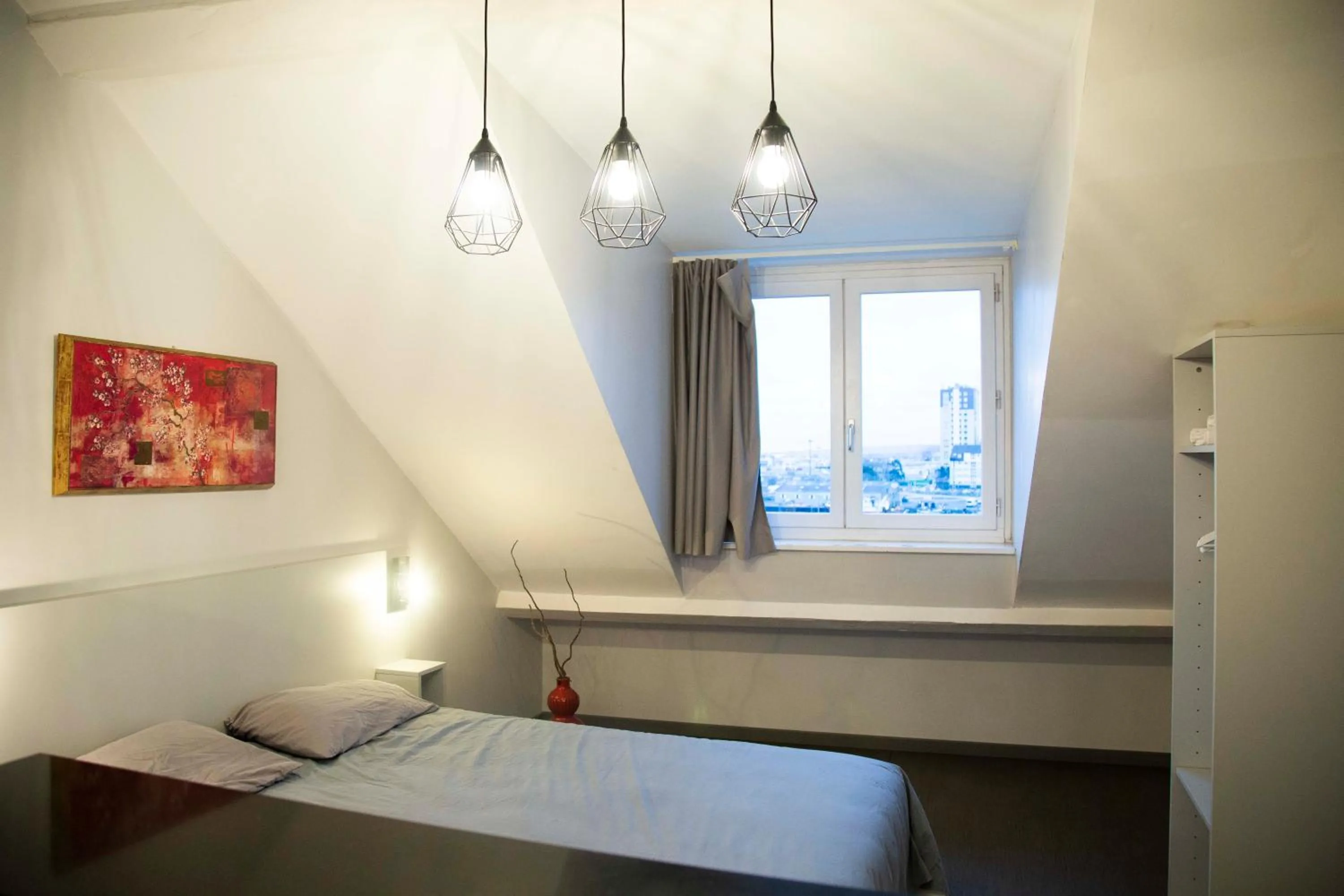 Bed in Smartappart Cherbourg (la rose des vents)