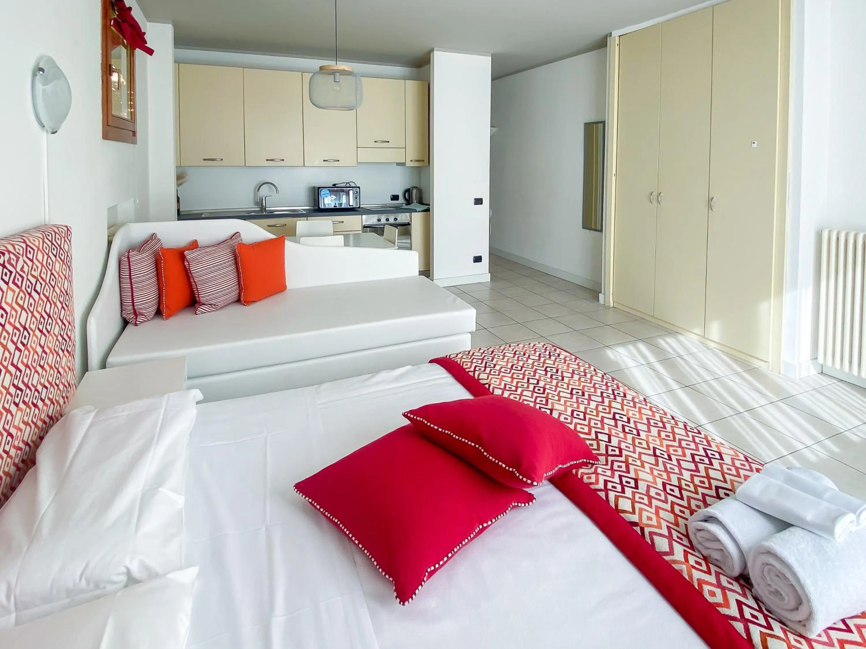 Living room, Bed in Cernobbio Residence