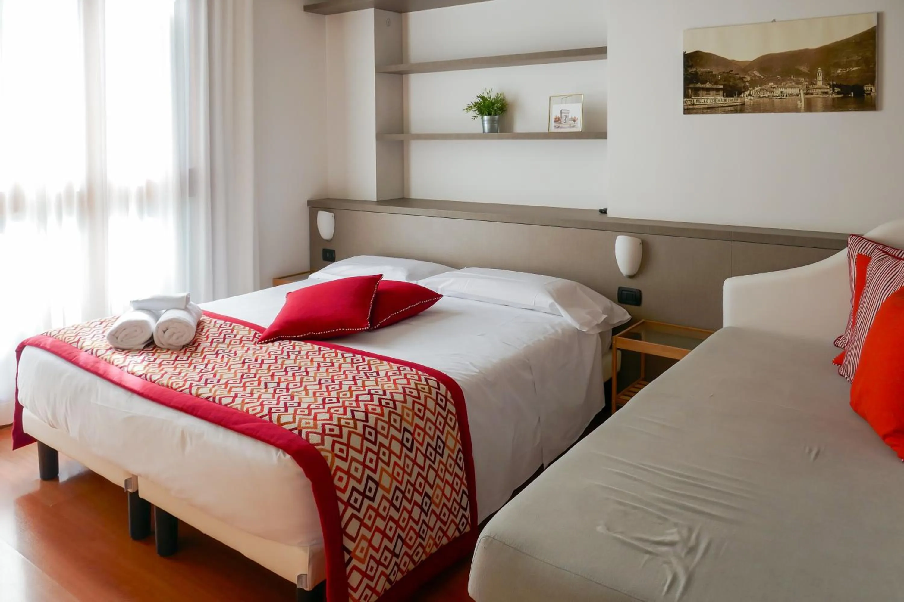 Living room, Bed in Cernobbio Residence