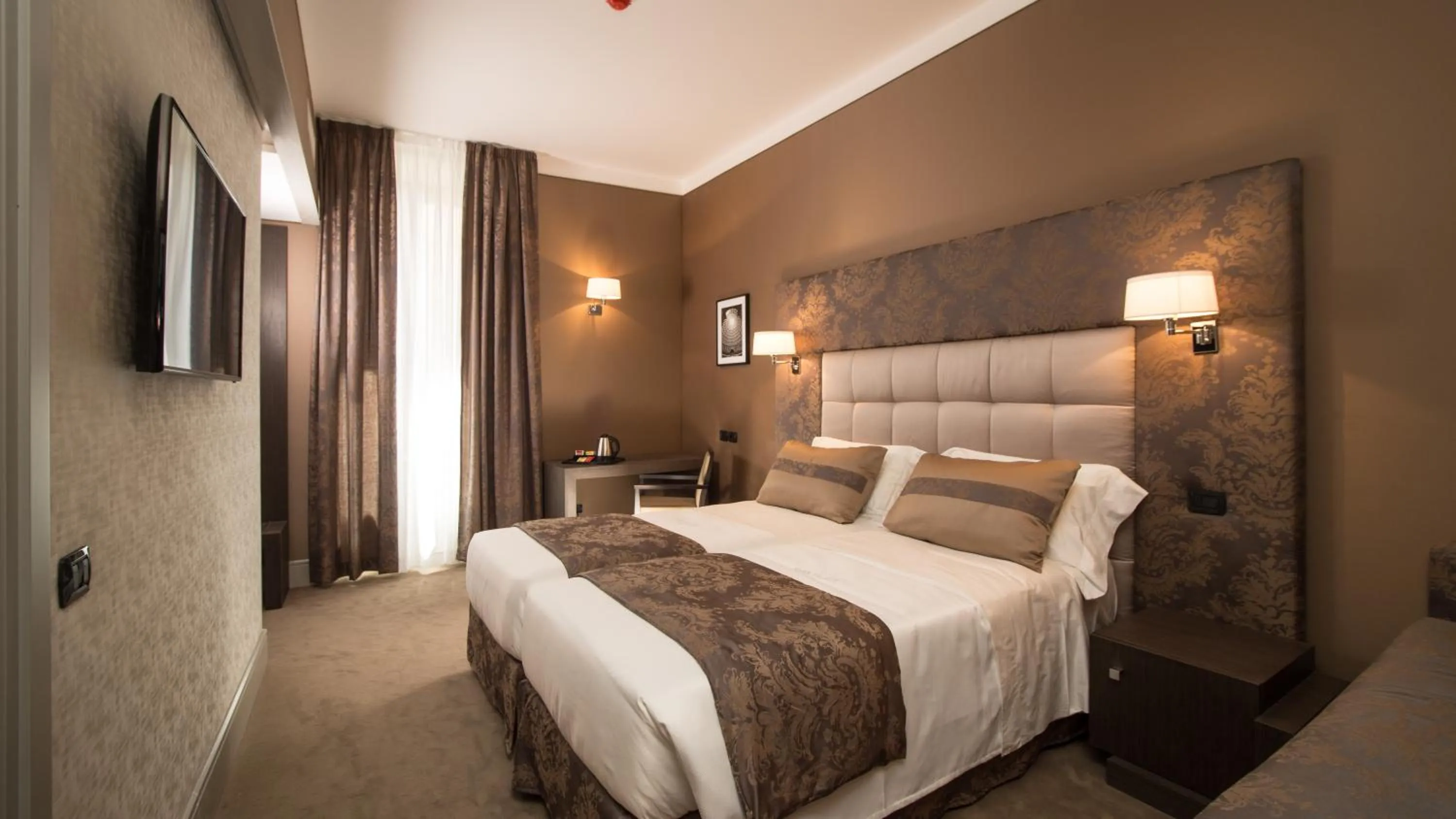 Bed in Monti Palace Hotel