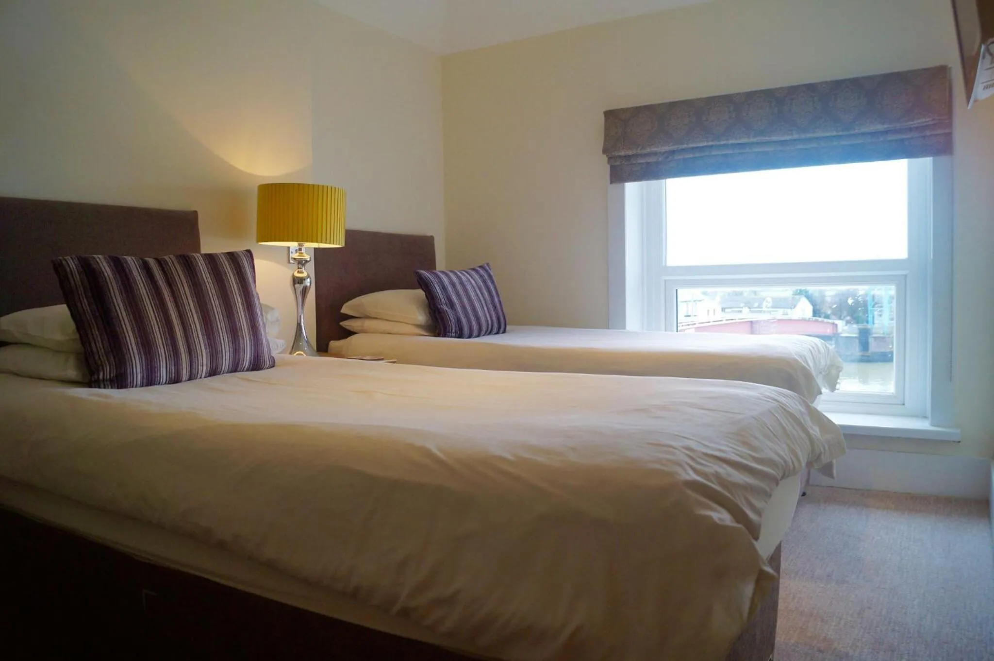 Bed in The Arun View Inn