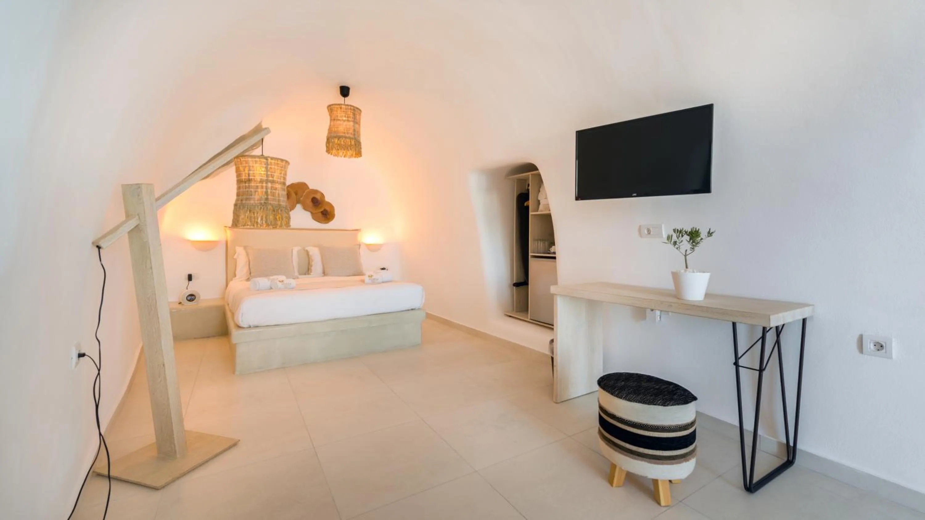 Bed in Iriana Suites