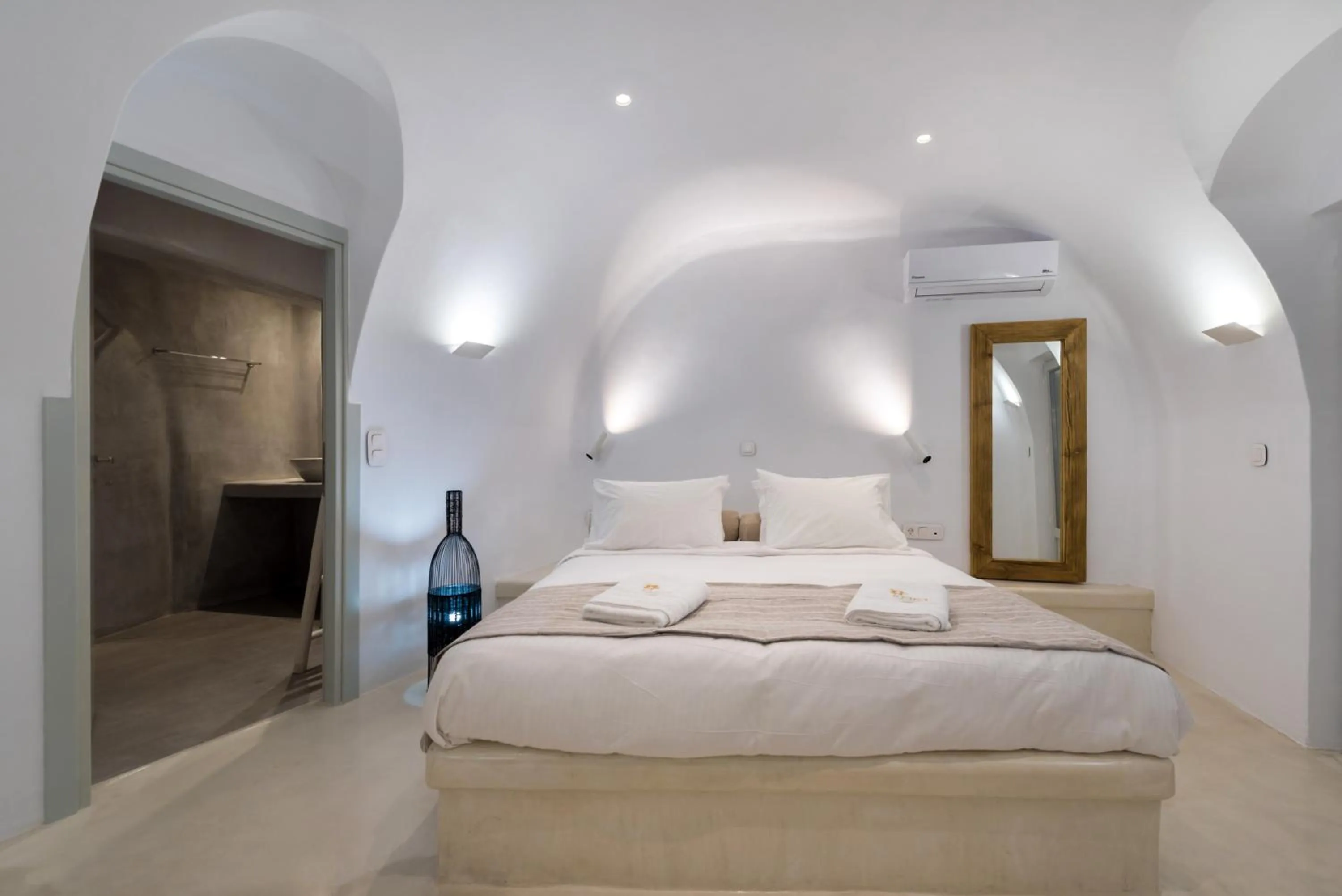 Bed in Iriana Suites