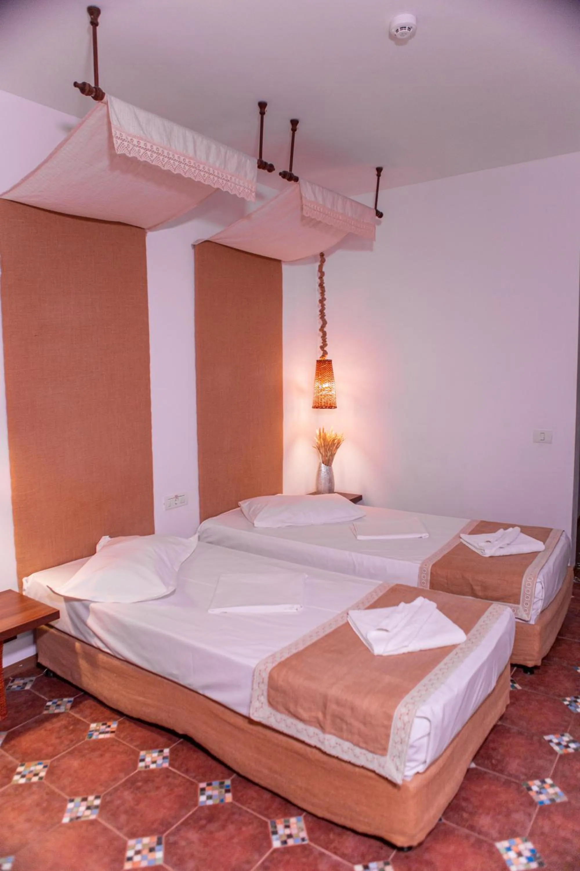 Bed in Hotel 2D Resort and Spa