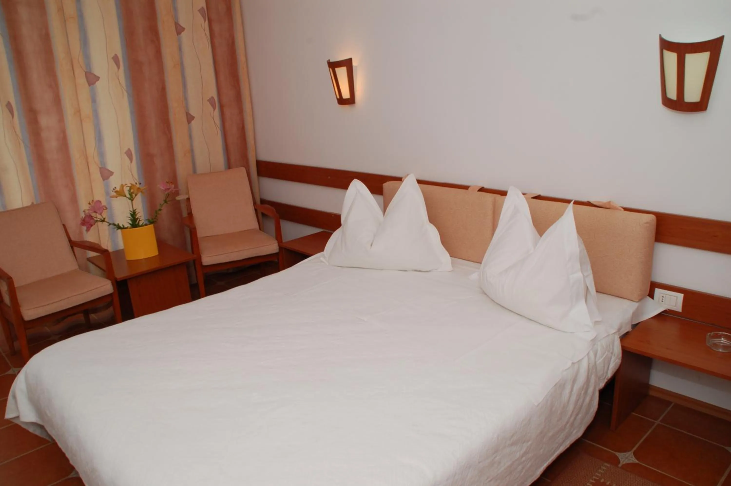 Bed in Hotel 2D Resort and Spa