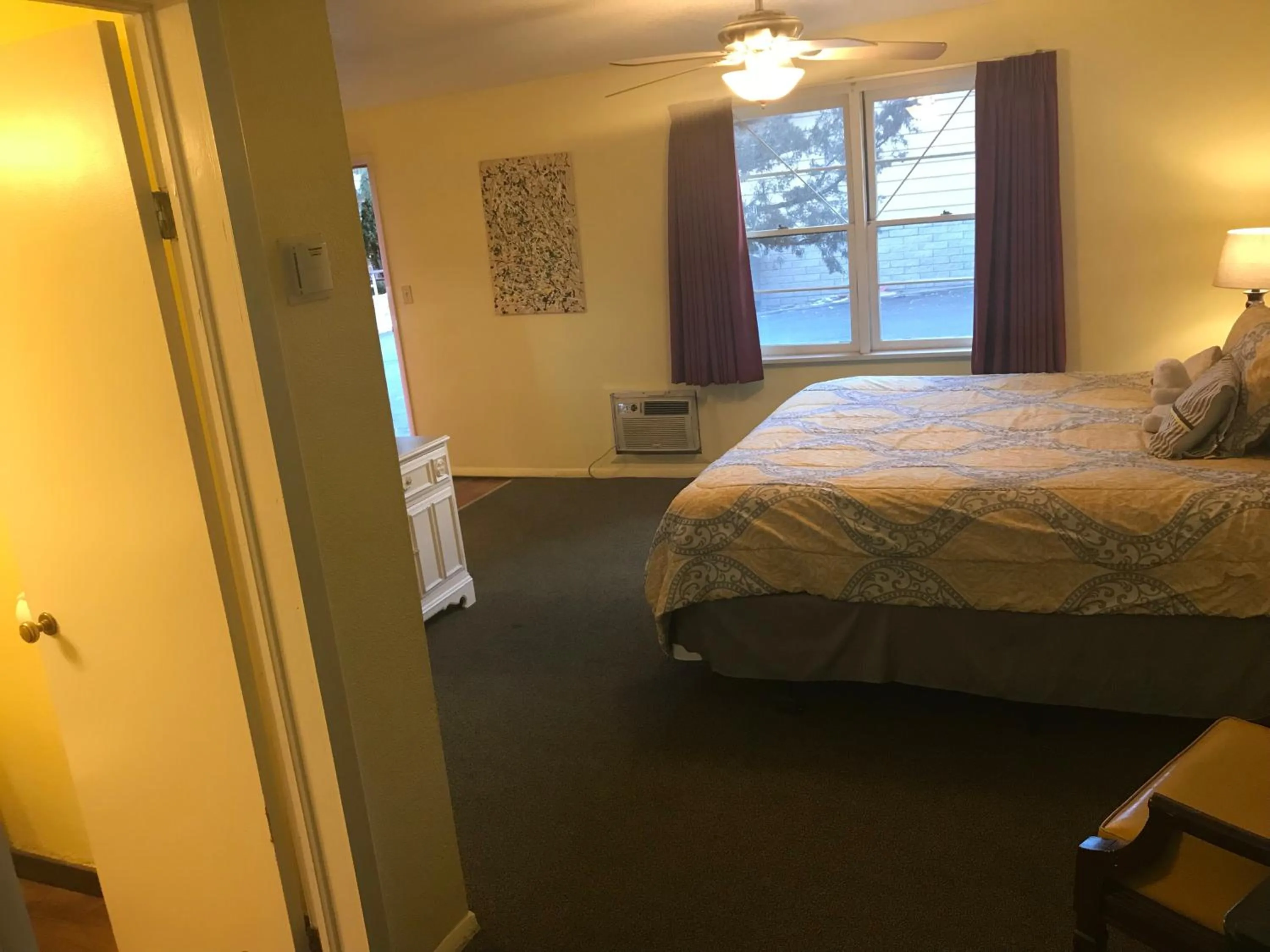 Bed in Caboose Motel & Gift Shop