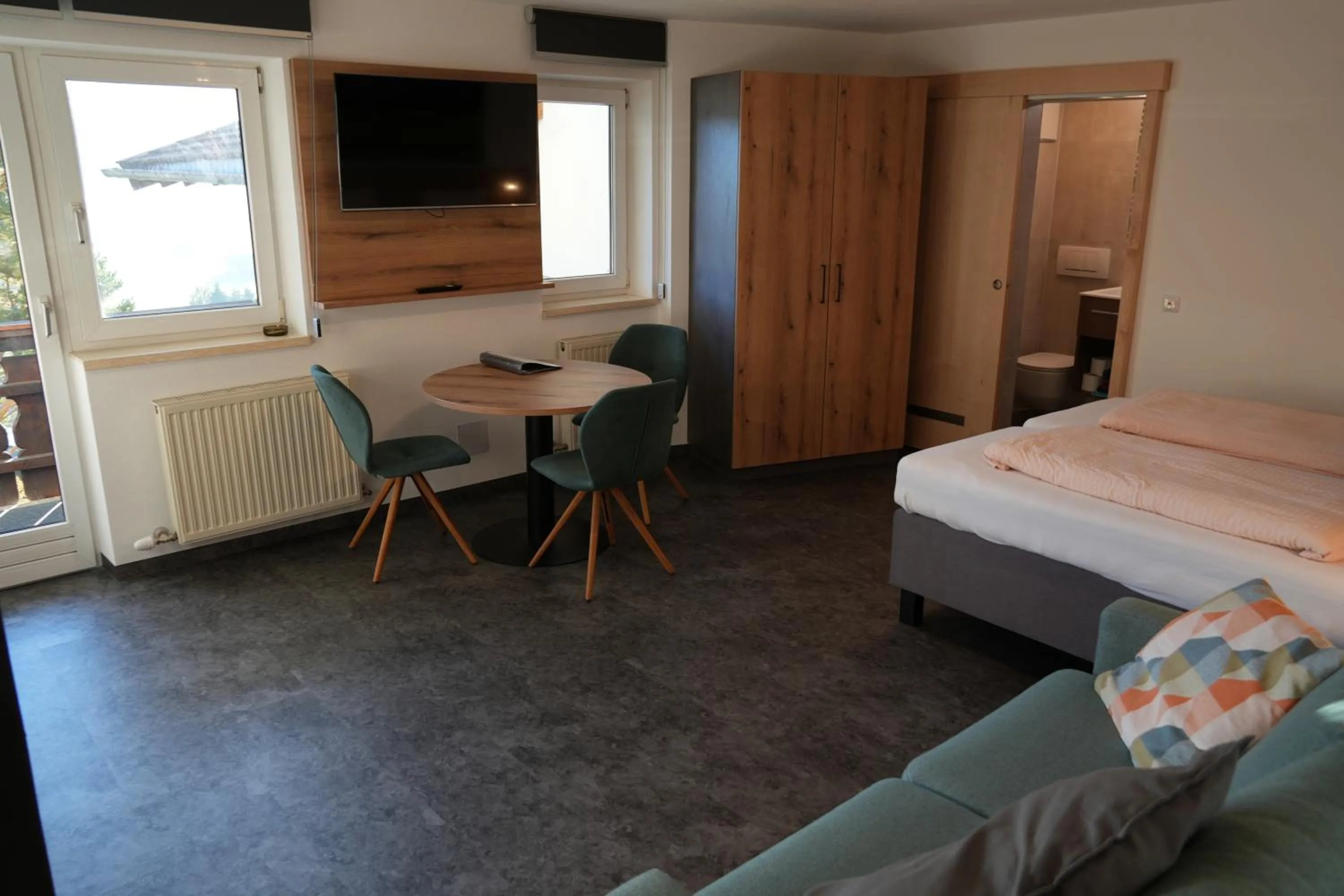 Kitchen or kitchenette, Bed in Ferienhaus Mott