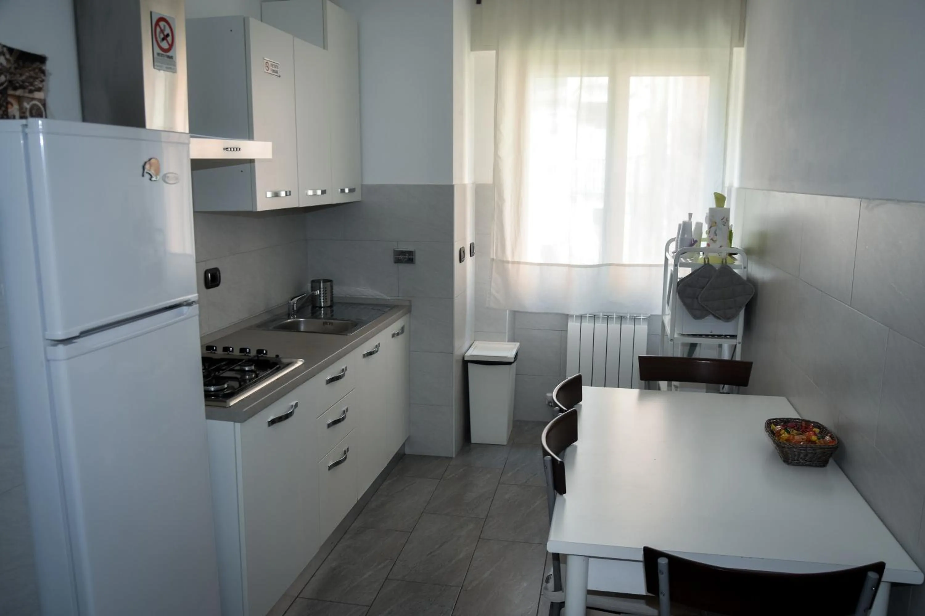 Kitchen or kitchenette in Affittacamere Delfo