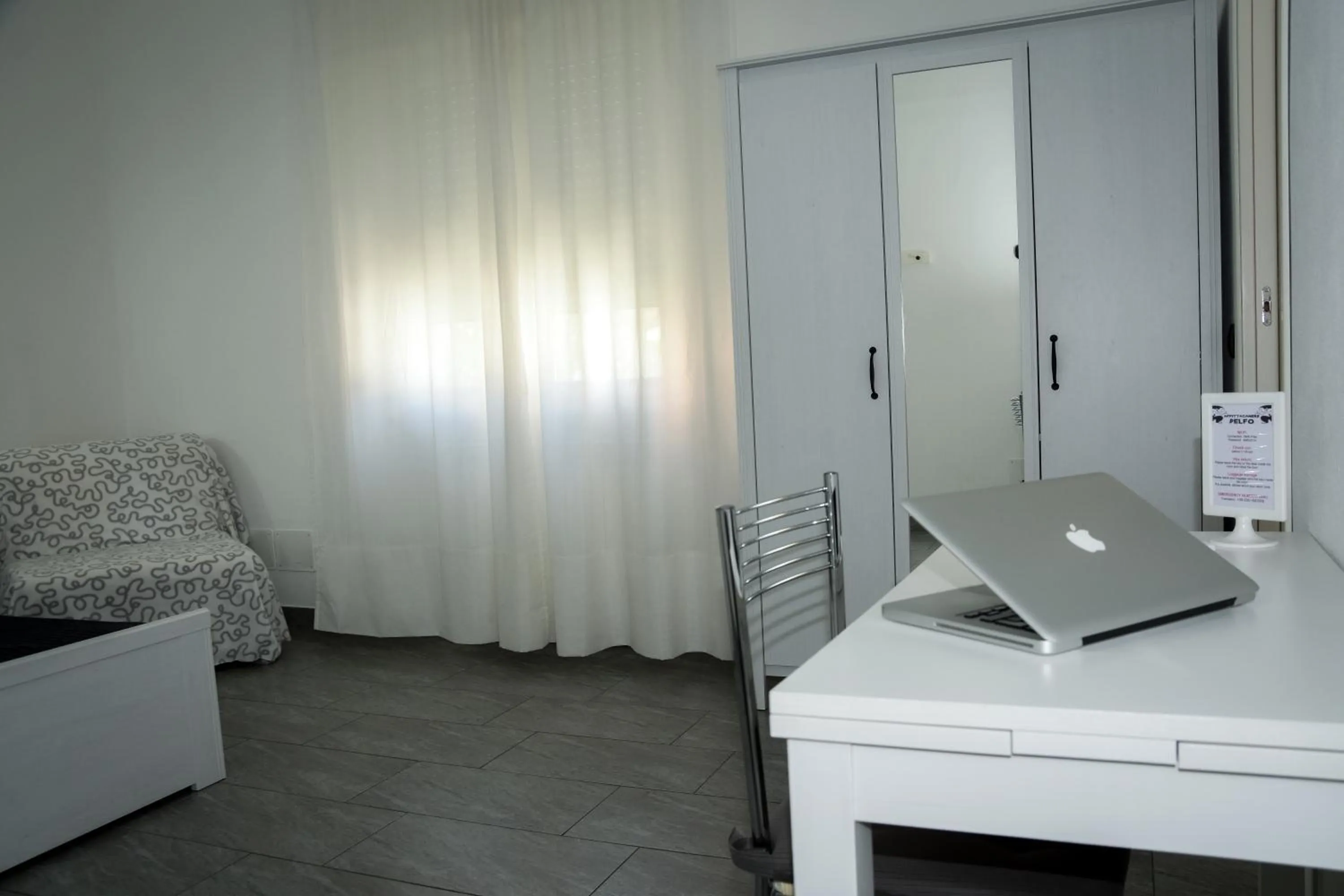 Bedroom in Affittacamere Delfo