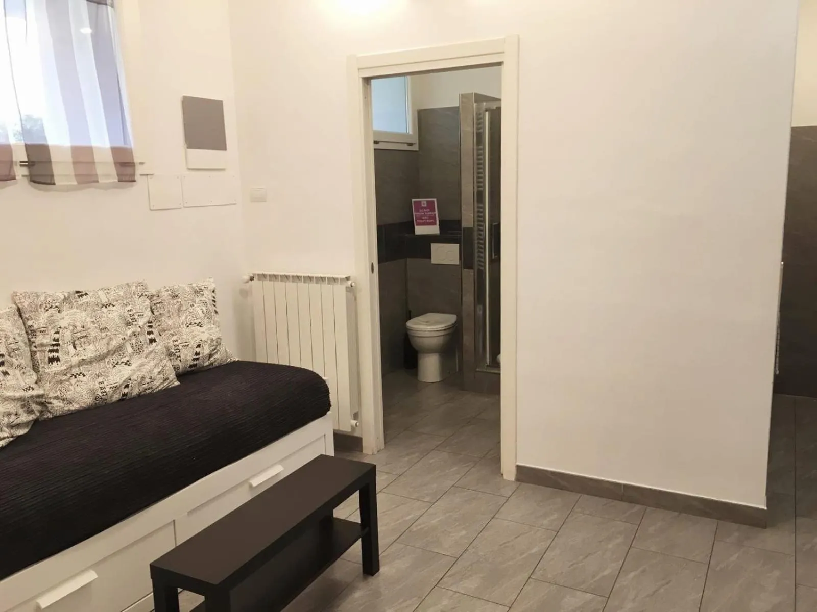 Seating area in Affittacamere Delfo