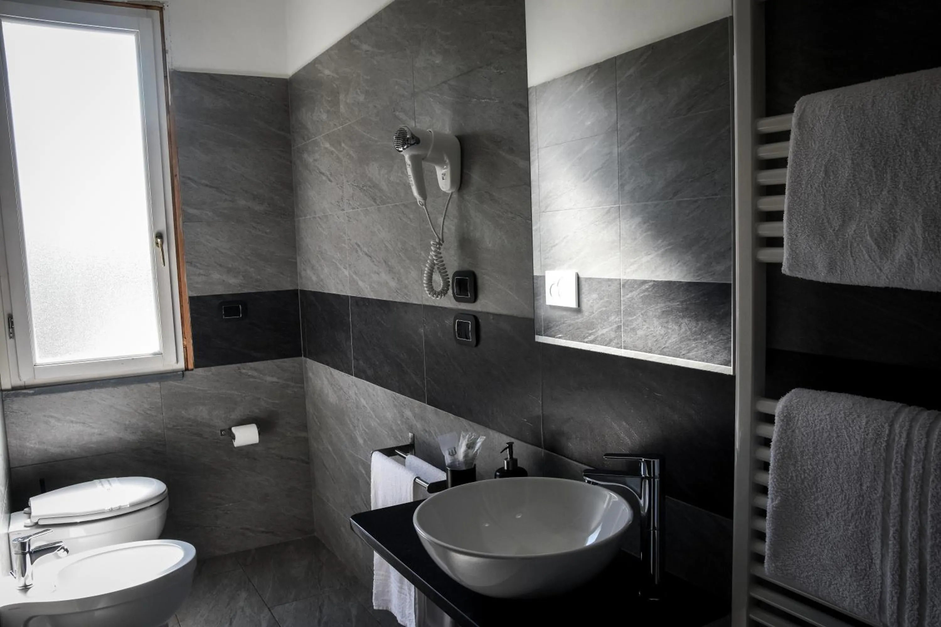 Bathroom in Affittacamere Delfo