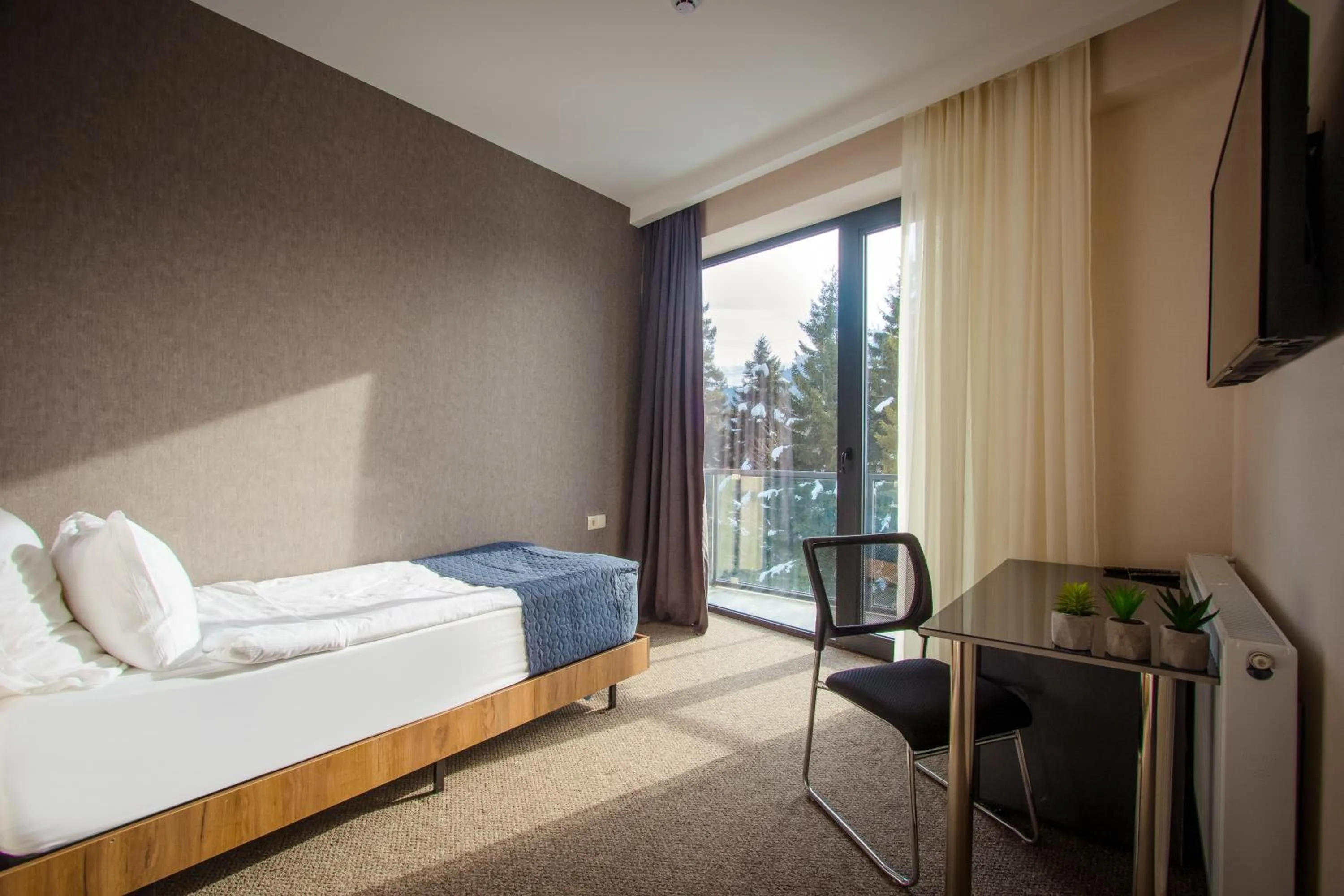 Bed in AuRoom Bakuriani Resort