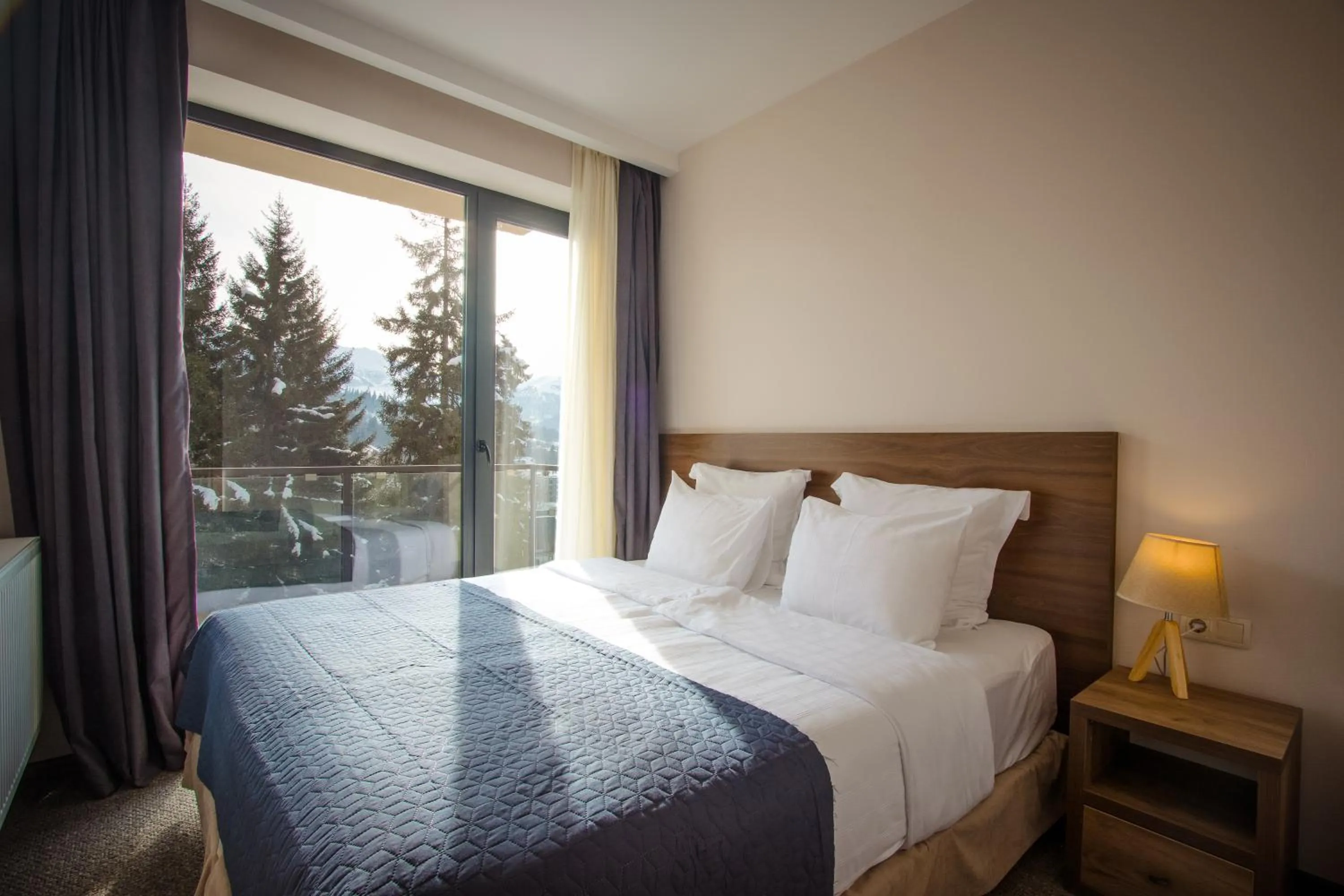 Bed in AuRoom Bakuriani Resort