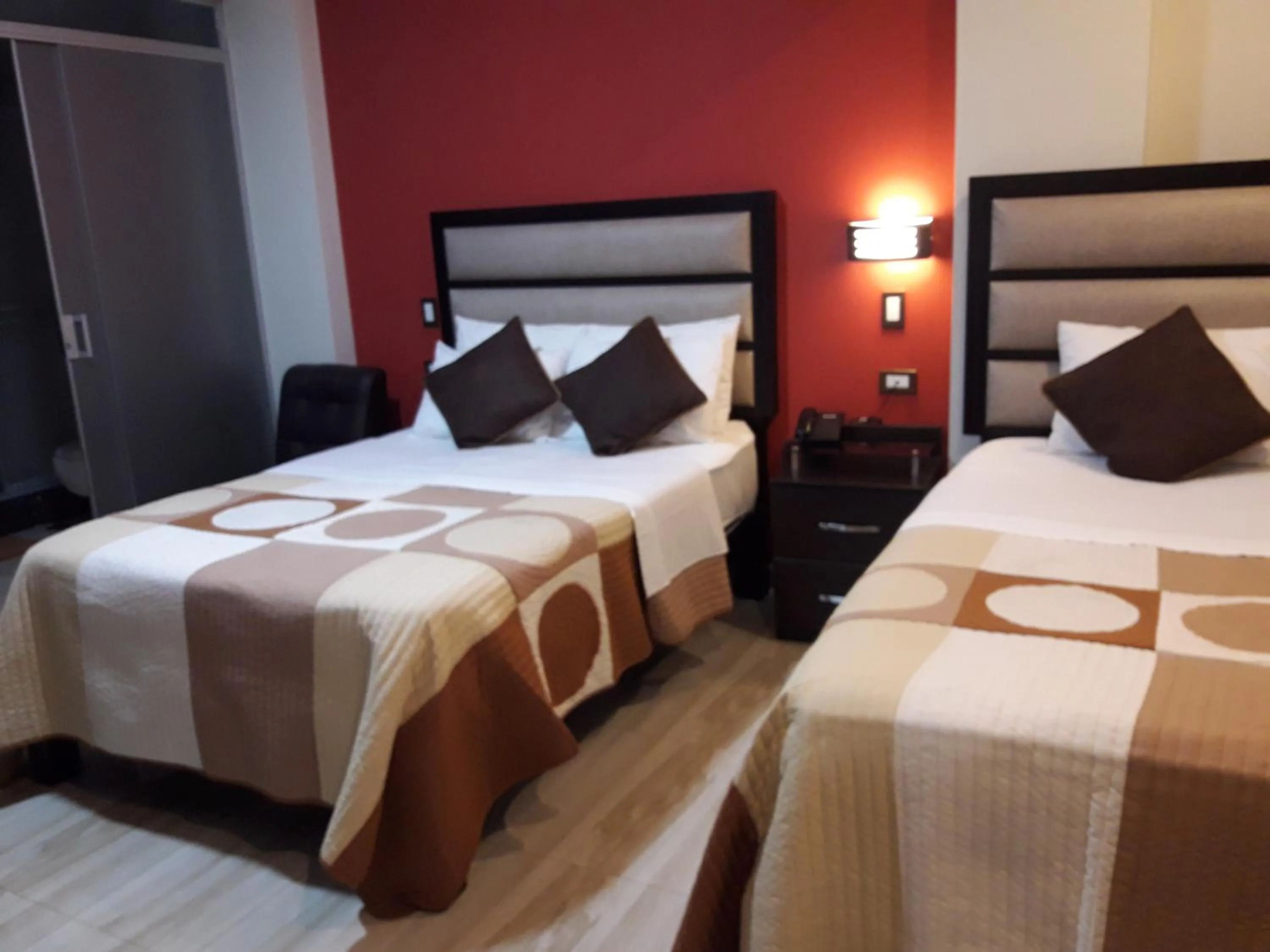 Bed in Gavina Inn Hotel