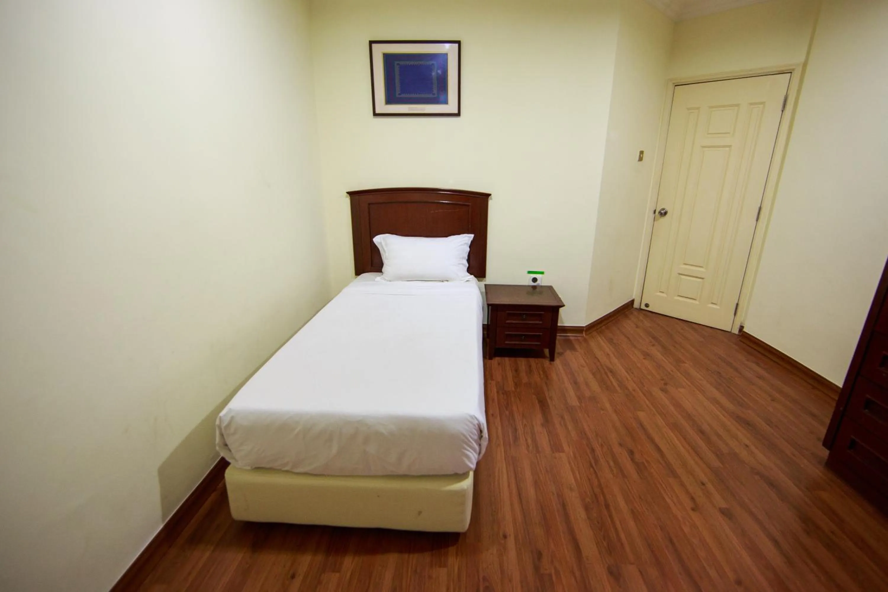 Bed in Beta Service Apartment