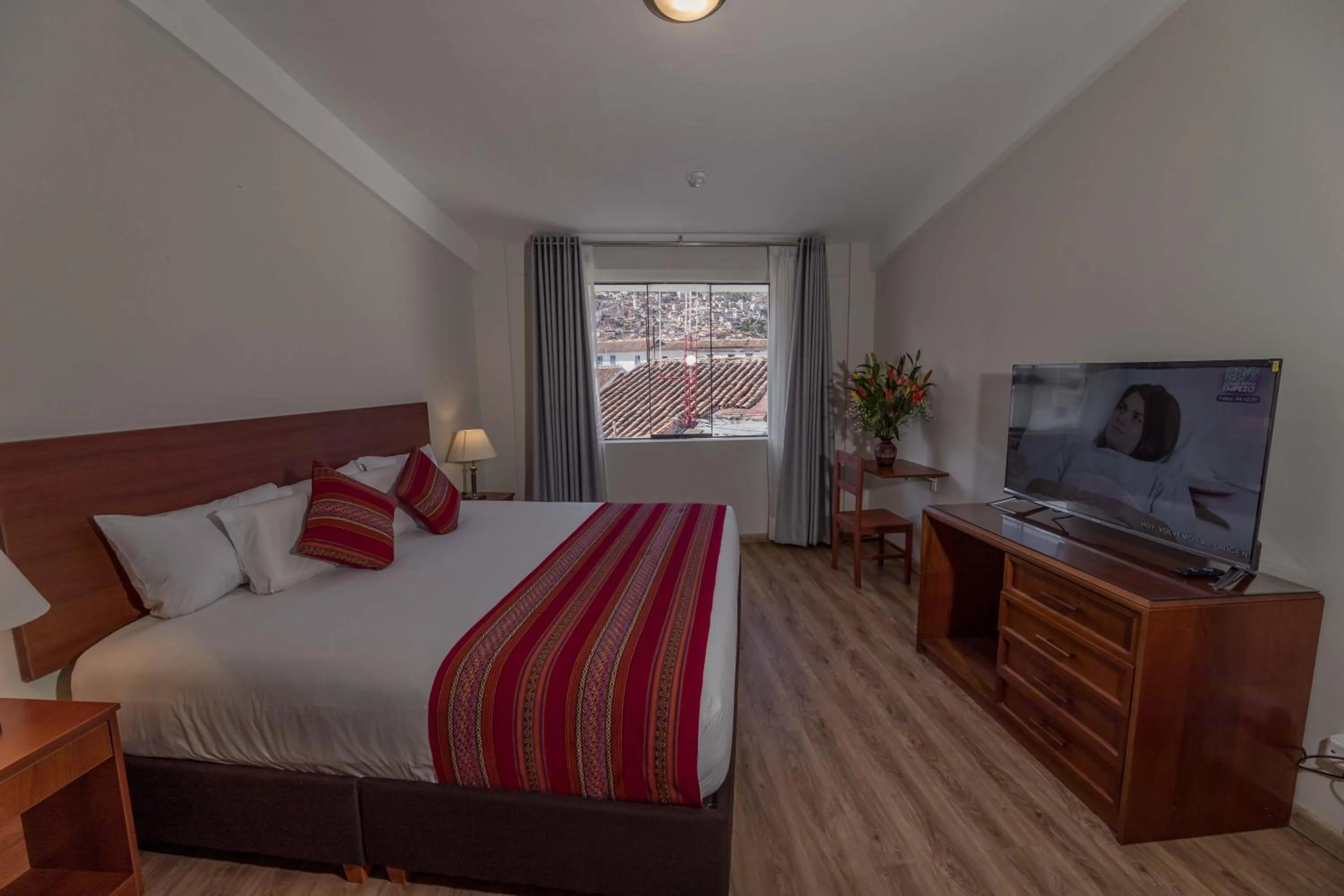 Bed in Quechua Plaza Hotel