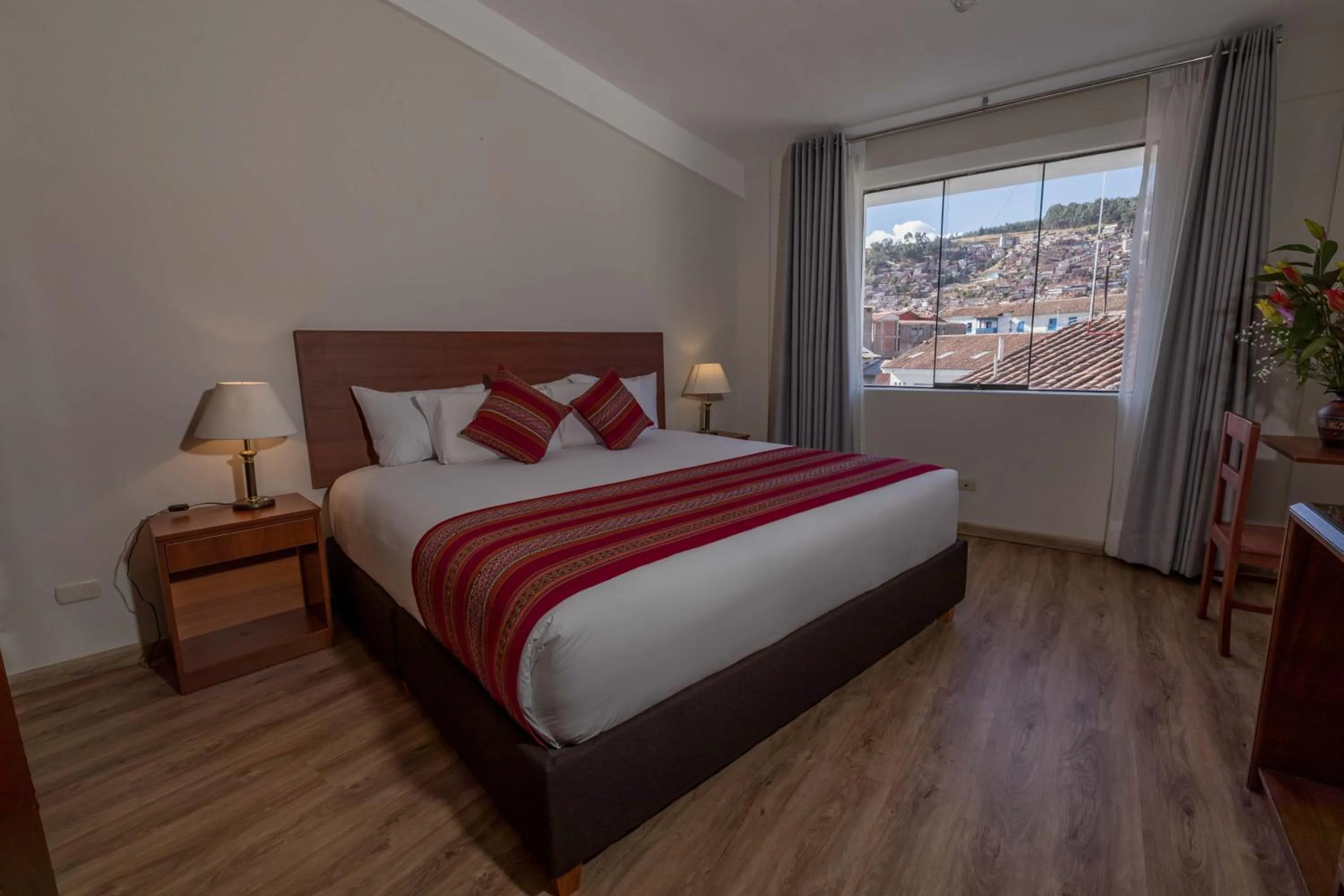 Bed in Quechua Plaza Hotel