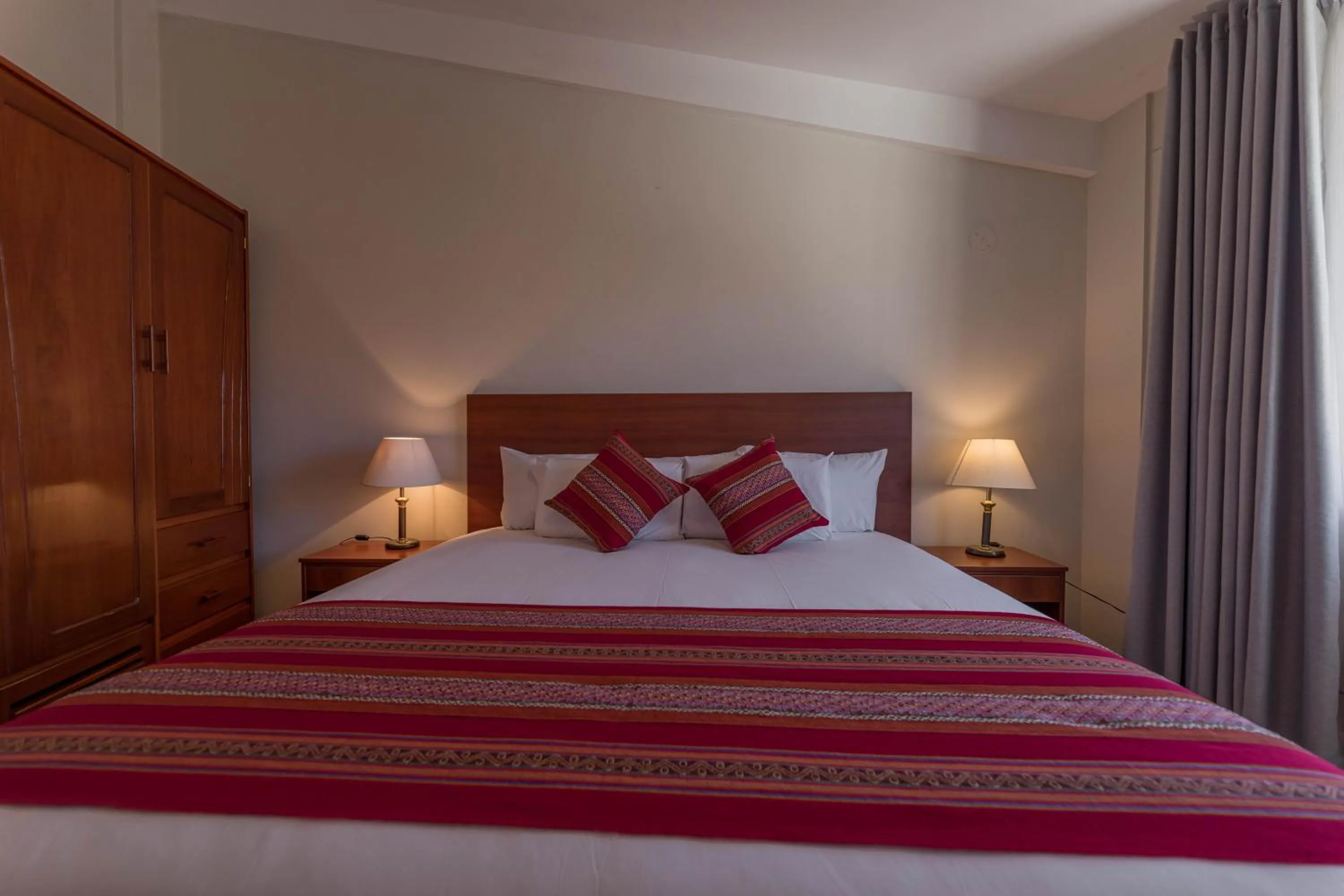 Bed in Quechua Plaza Hotel