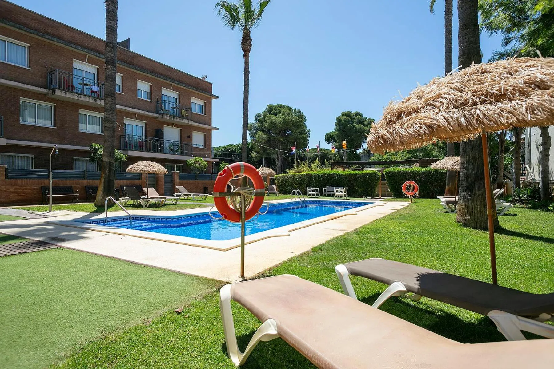 Swimming pool in Apartamentos Velor