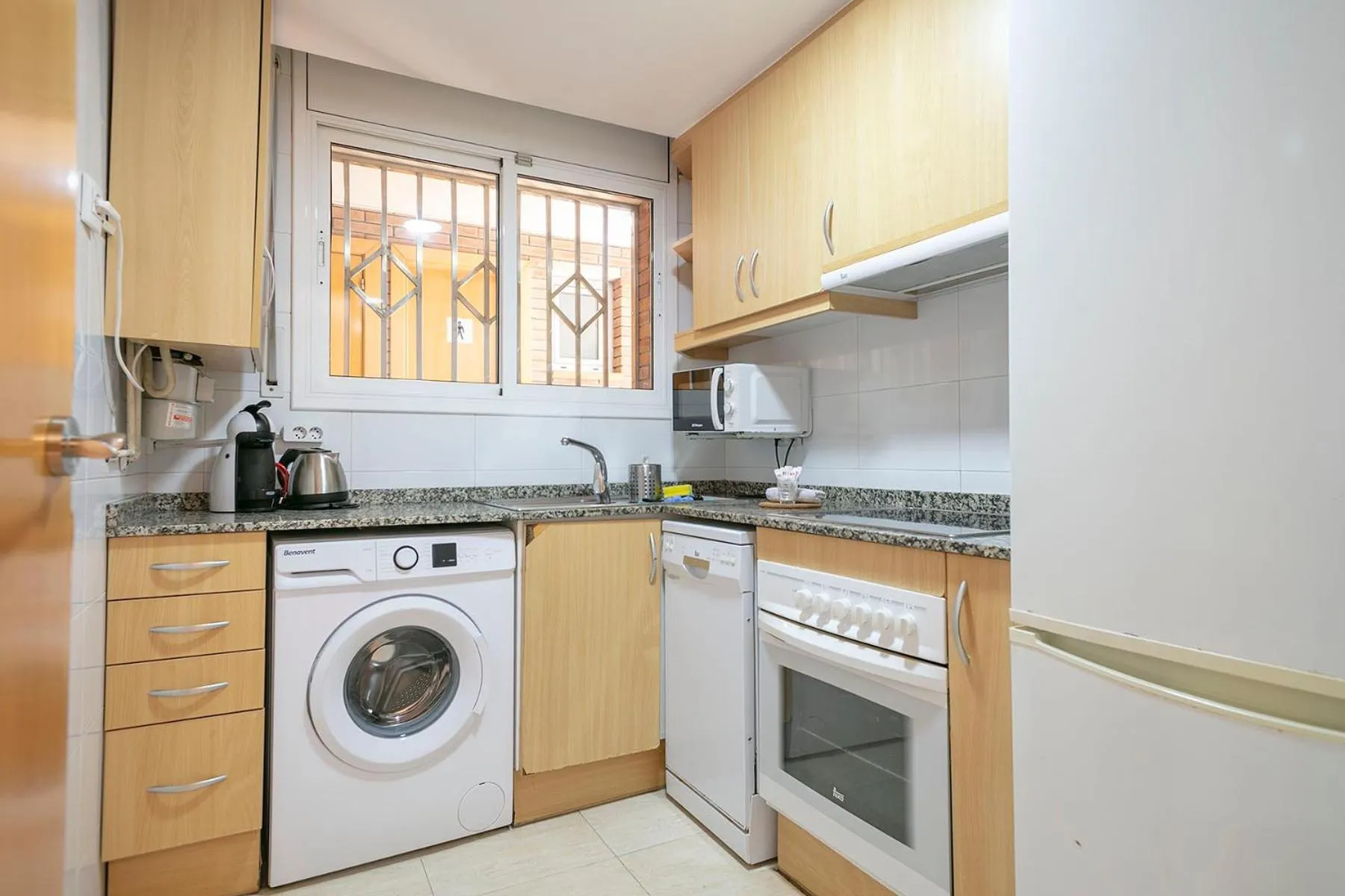 Kitchen or kitchenette in Apartamentos Velor