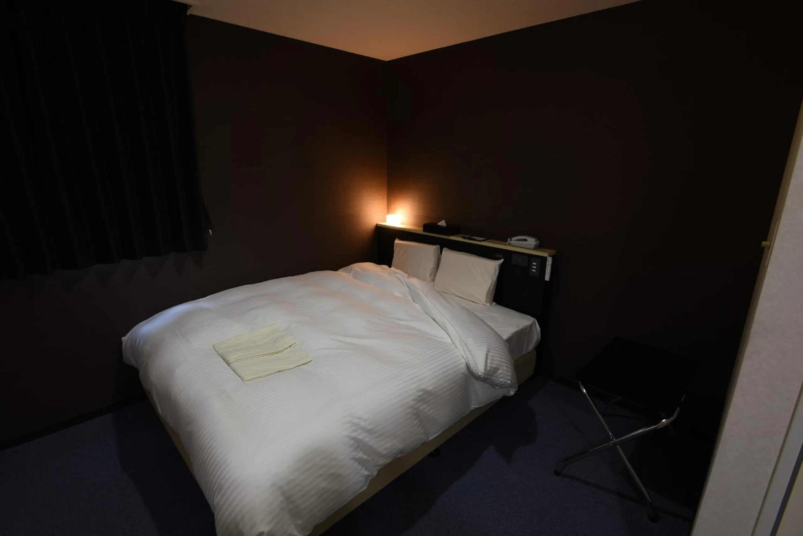 Photo of the whole room, Bed in R Hotels Inn Hokkaido Asahikawa