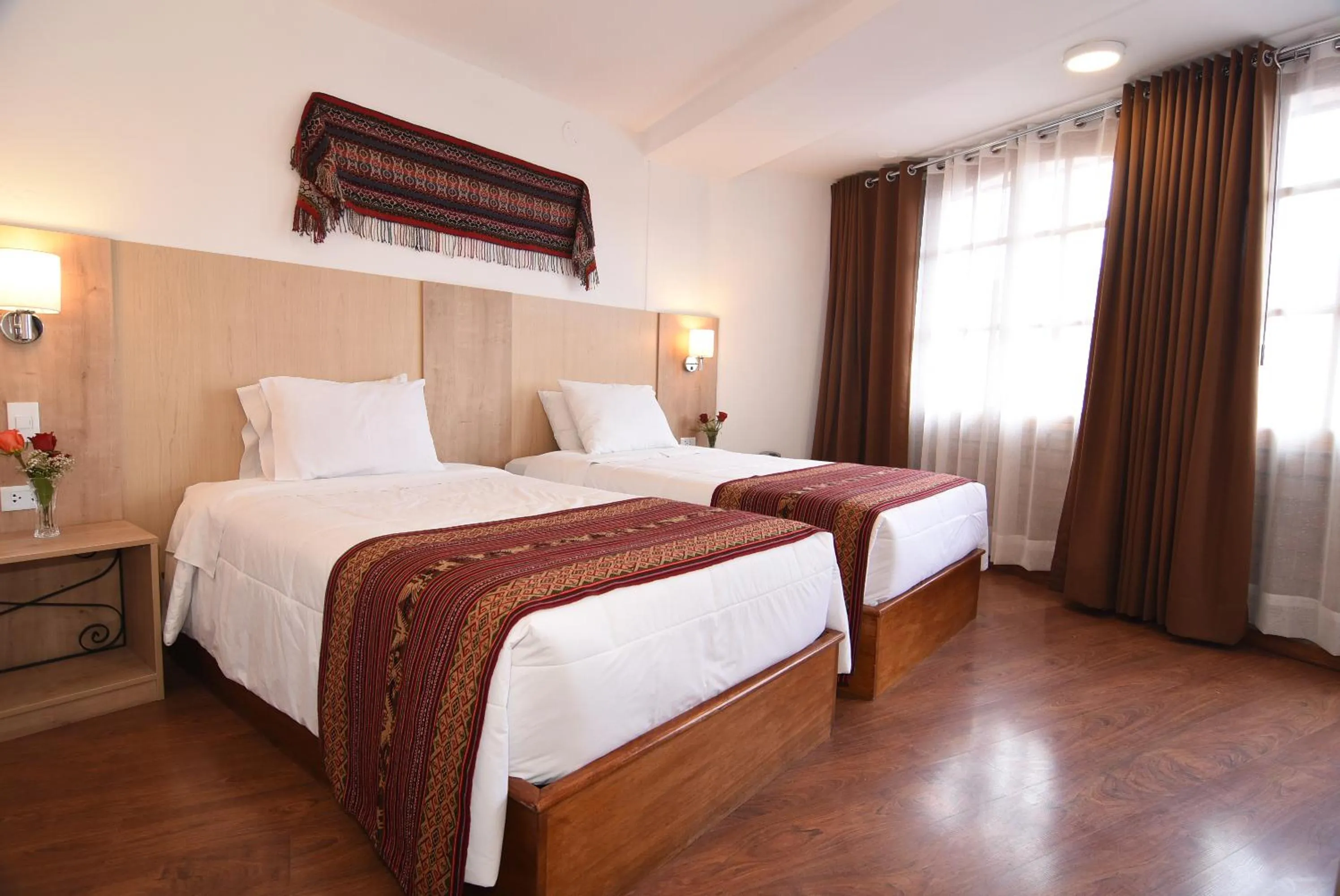 Bed in Hotel Prisma Cusco