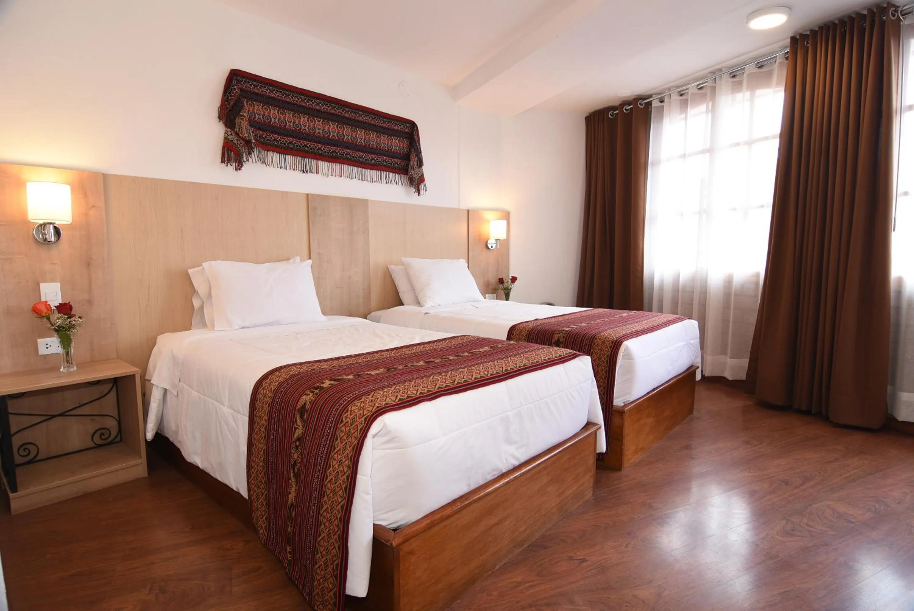 Bed in Hotel Prisma Cusco