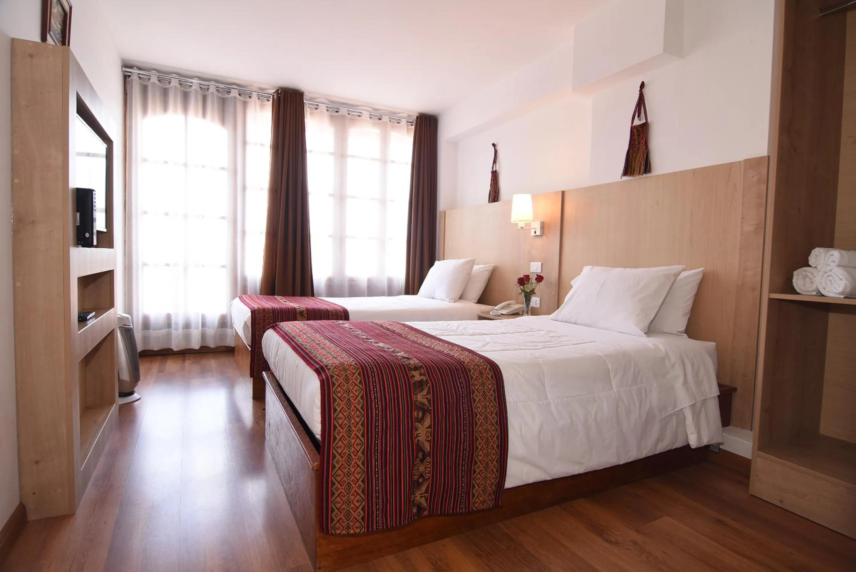 Bed in Hotel Prisma Cusco