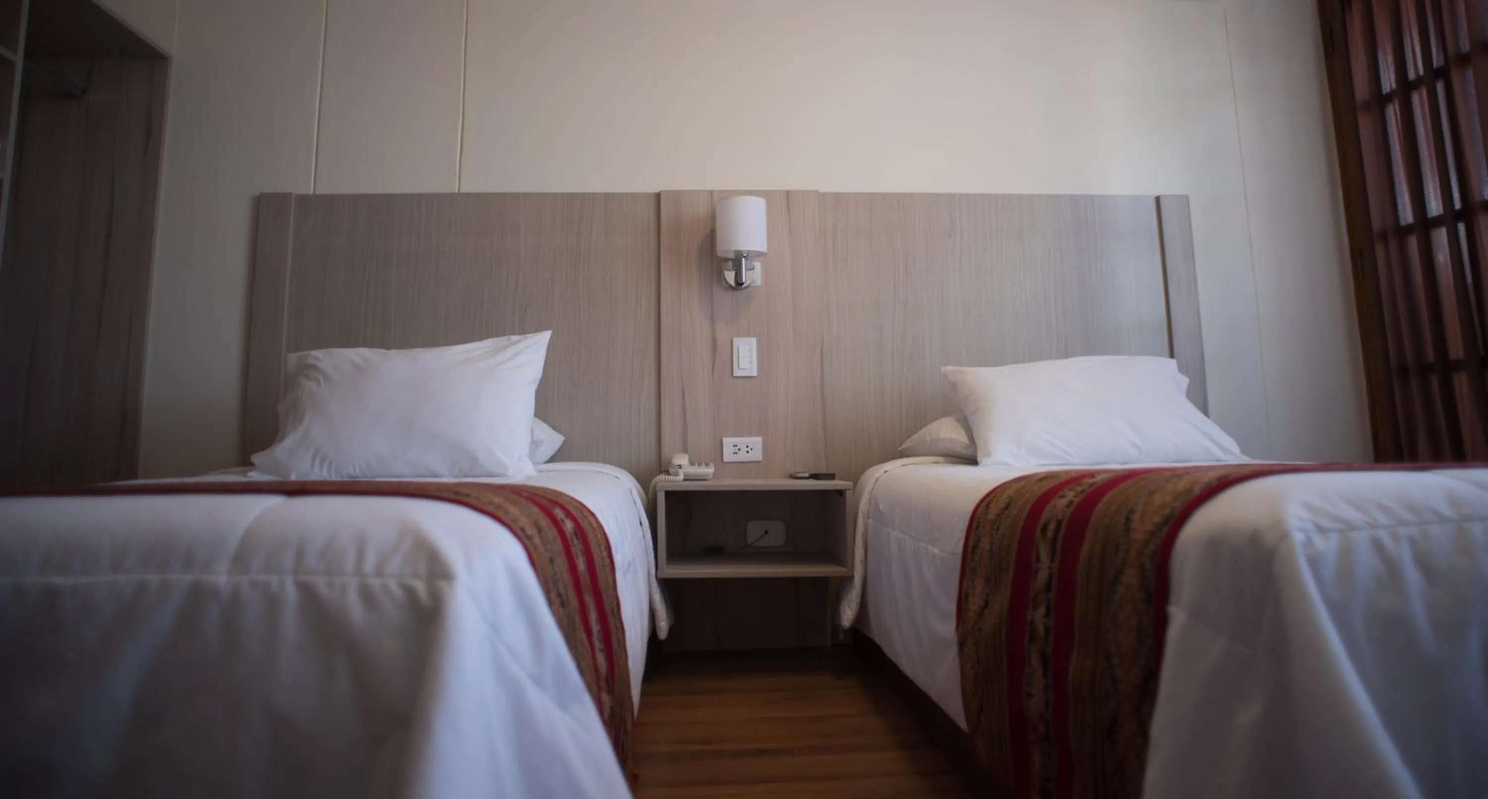 Bed in Hotel Prisma Cusco
