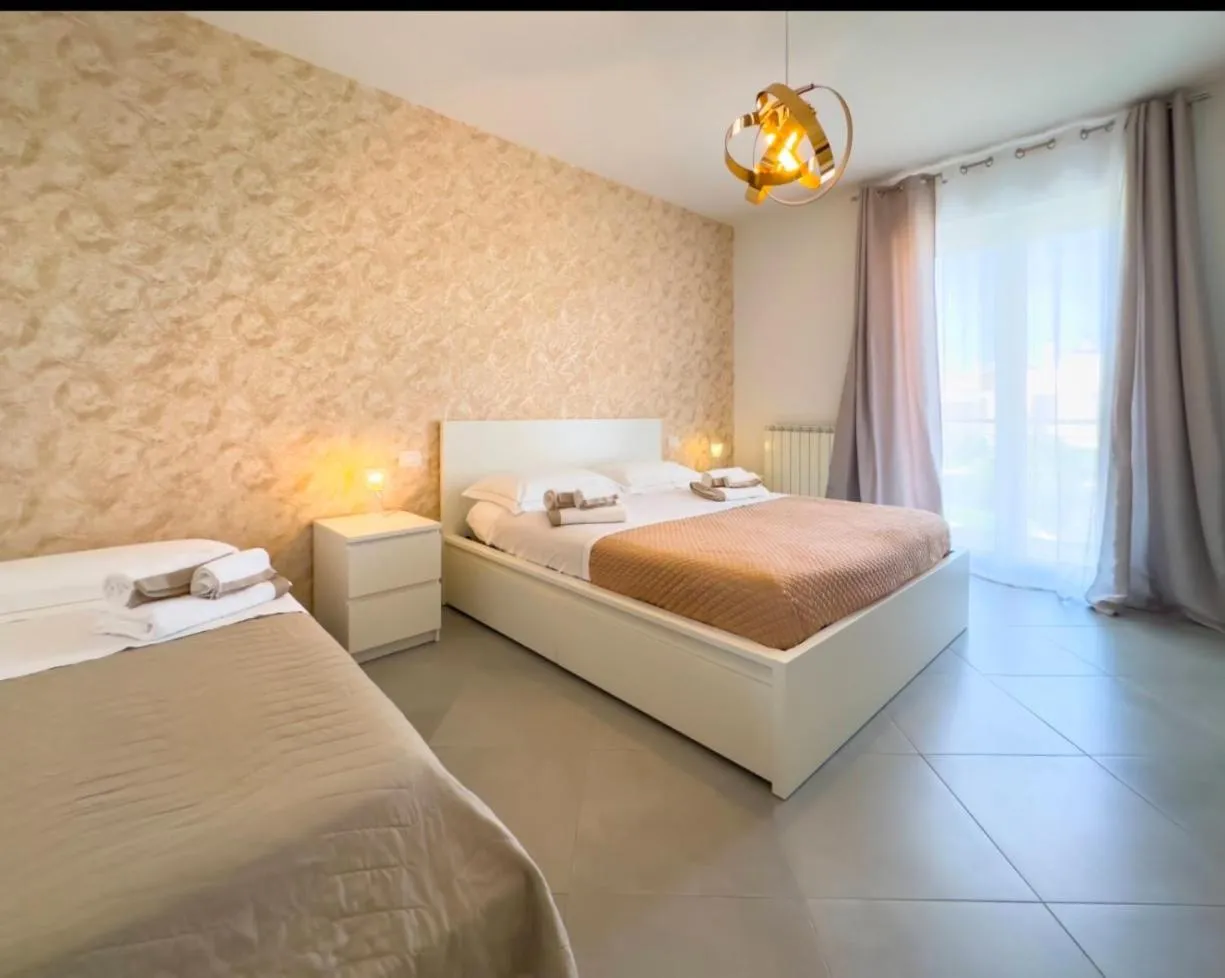 Bed in B&B ALLA NIVIERA