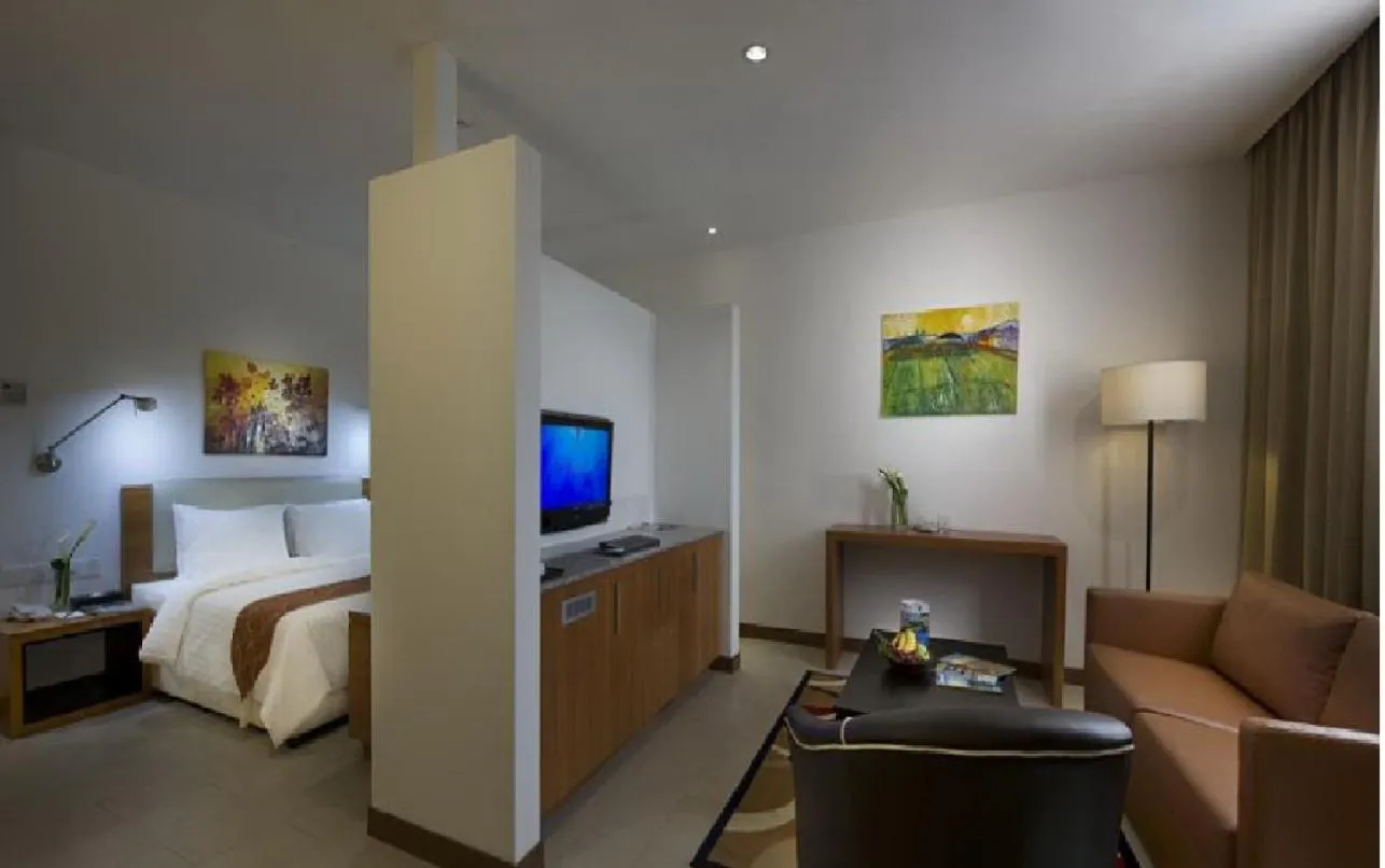 Bed in Gloria Swiss Hotel & Apartment Sandakan