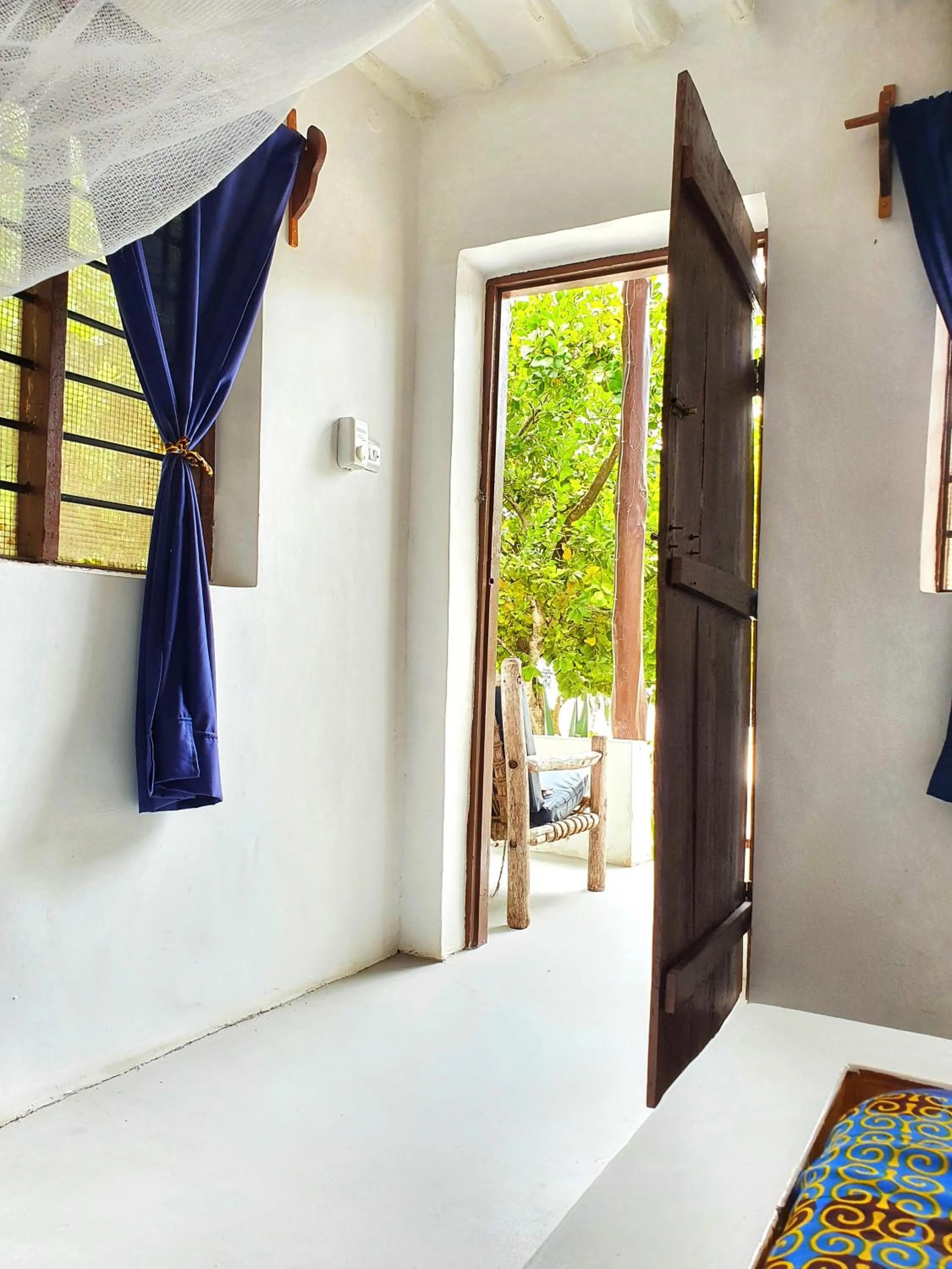 View (from property/room), Bed in Blue Palm Zanzibar
