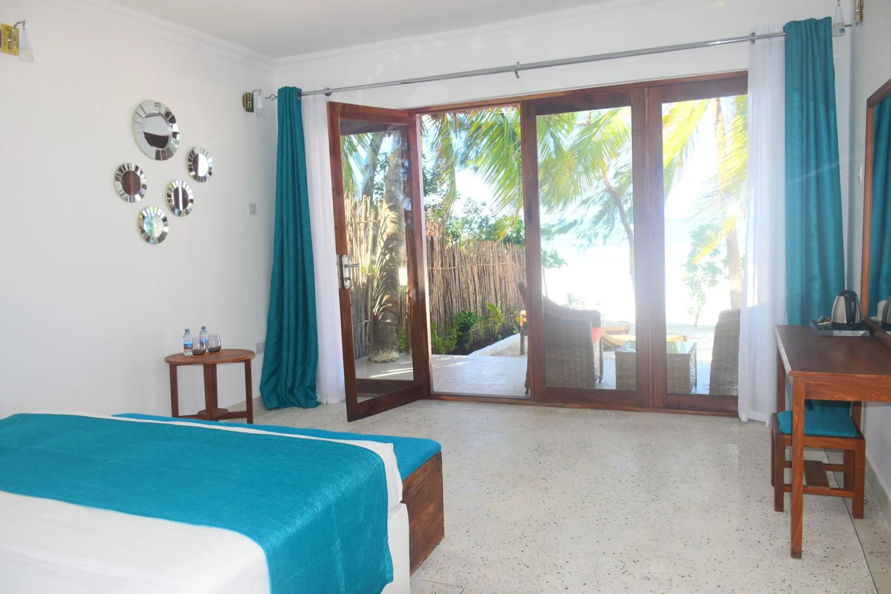 Photo of the whole room, Bed in Blue Palm Zanzibar