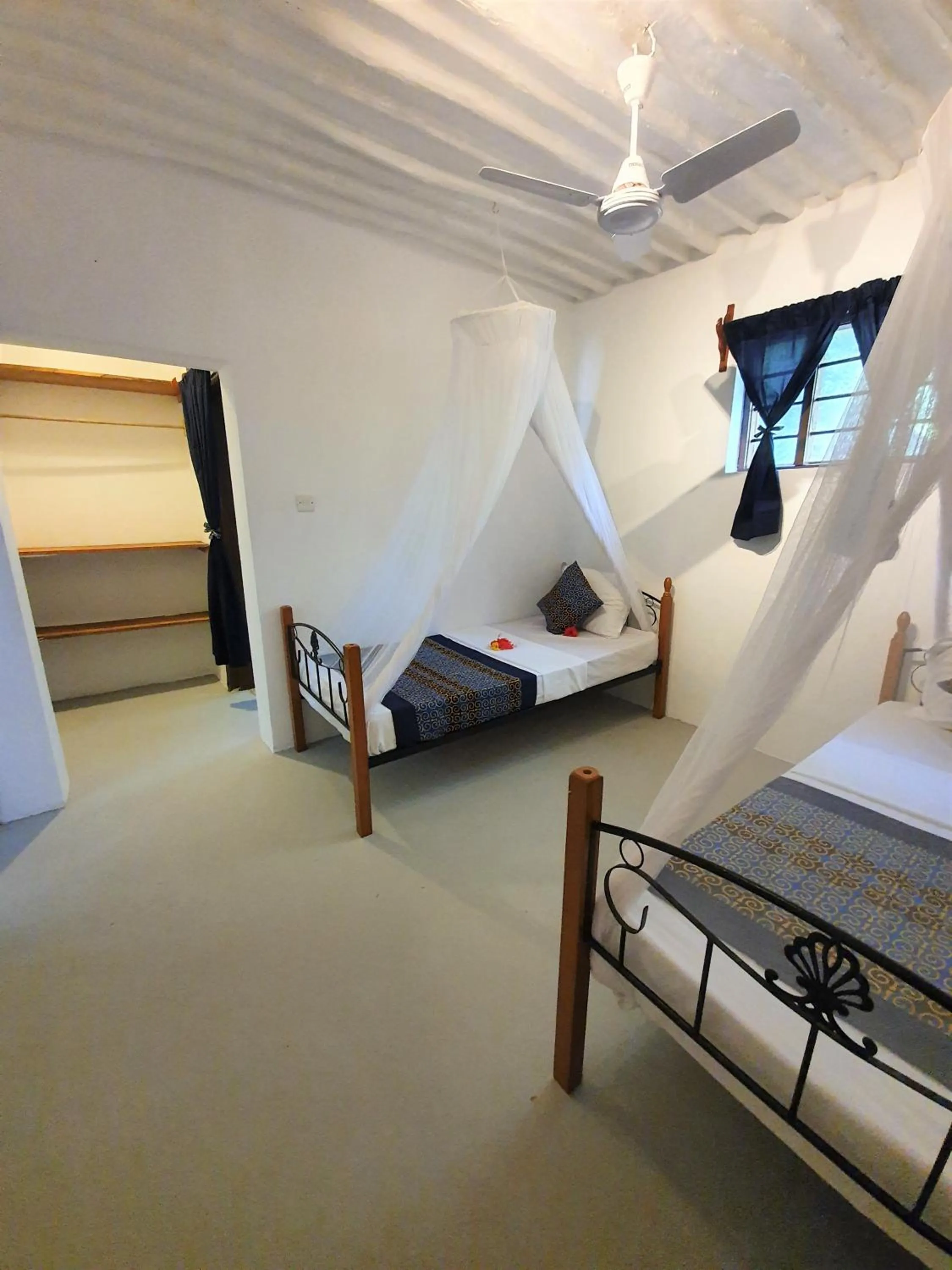 Bed in Blue Palm Zanzibar