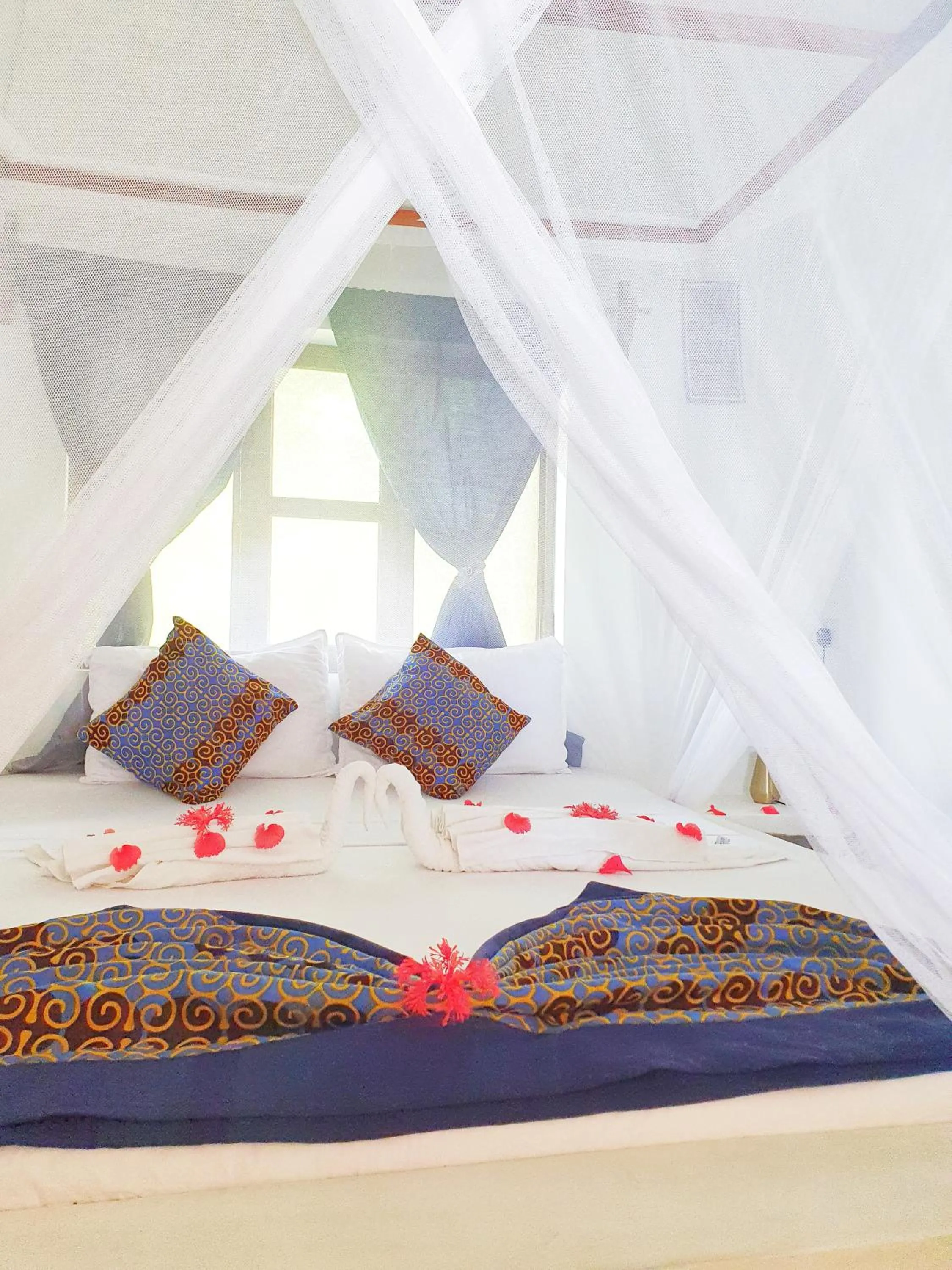 Bed in Blue Palm Zanzibar