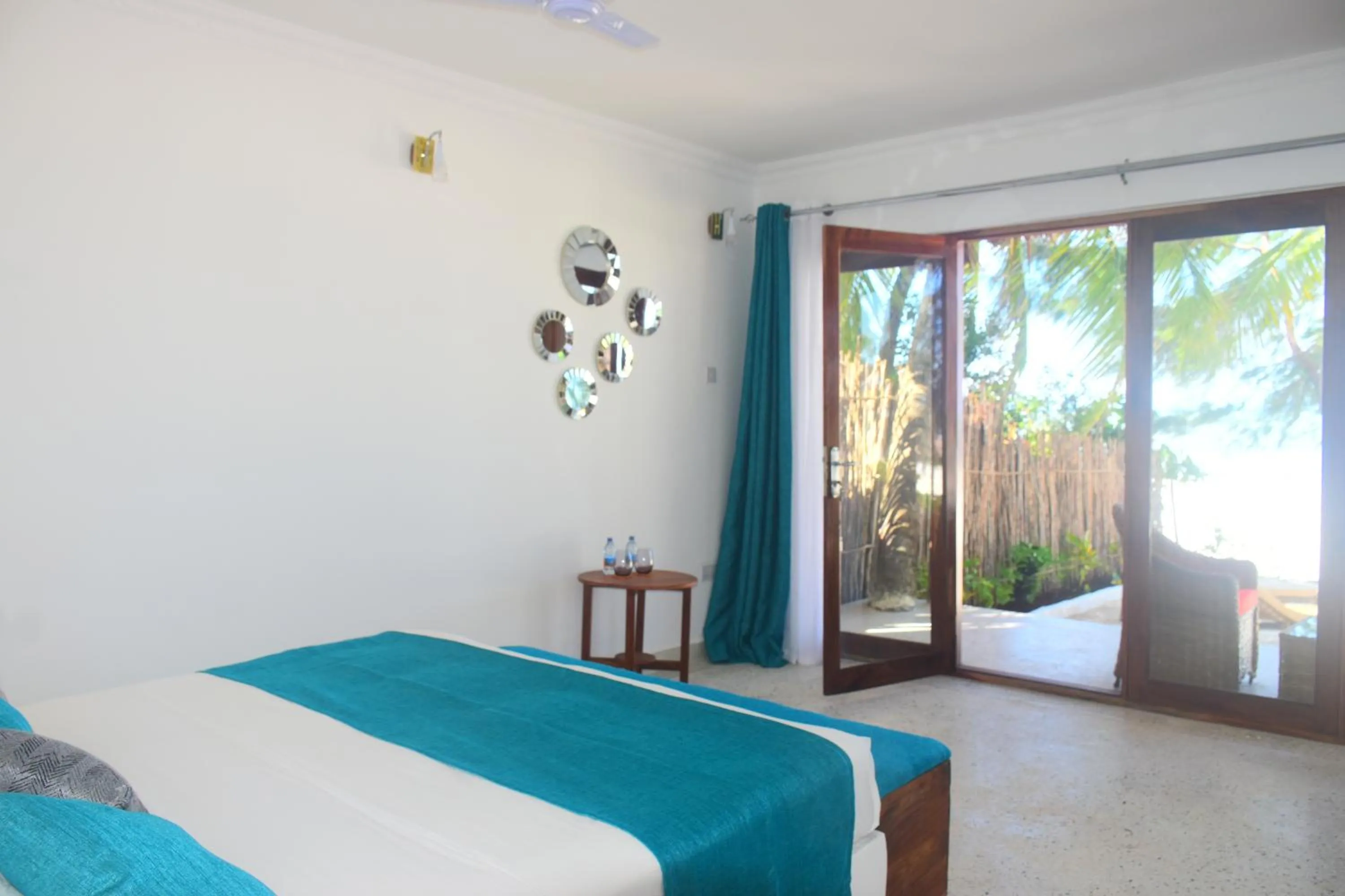 Photo of the whole room, Bed in Blue Palm Zanzibar