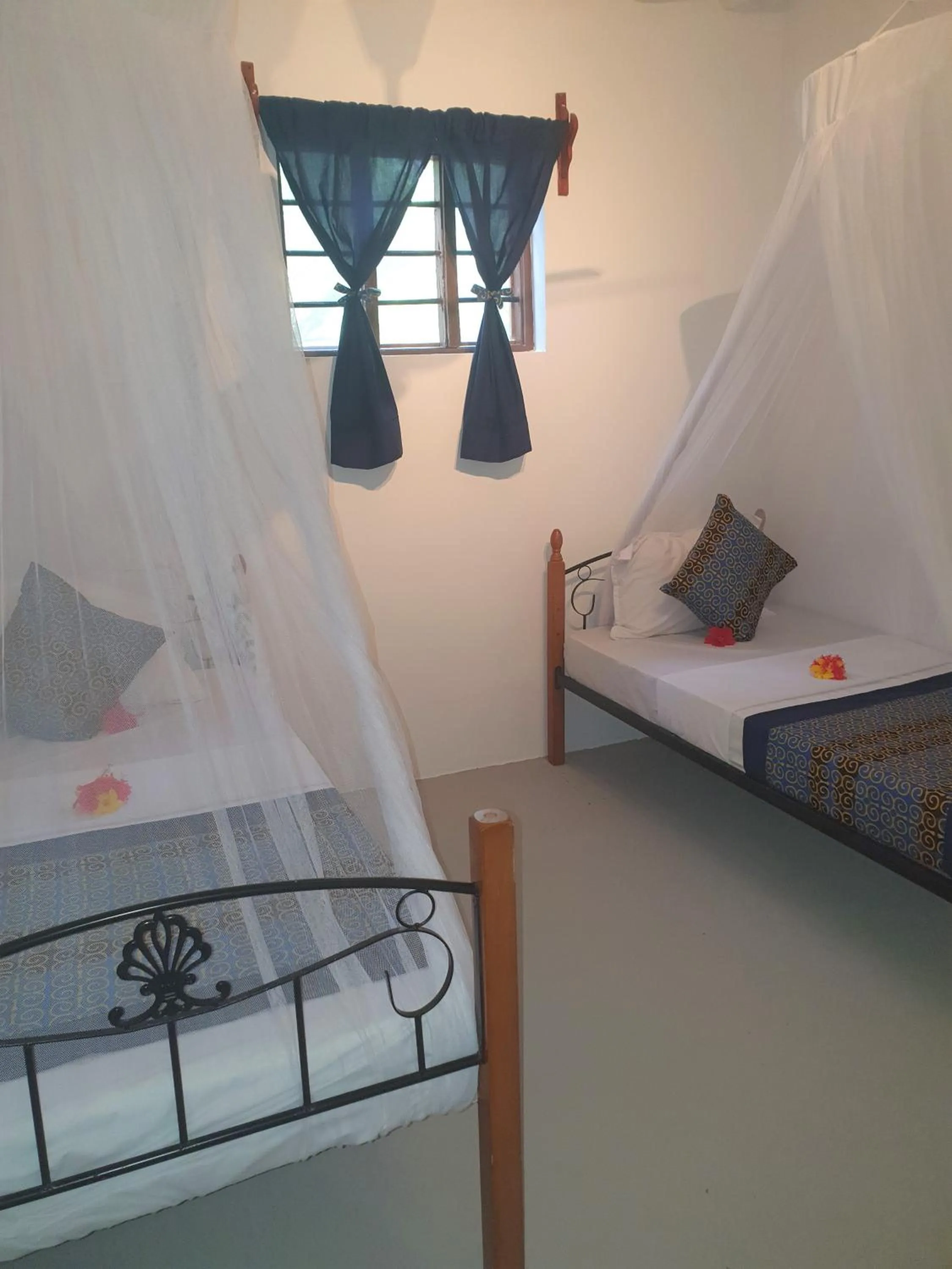 Bed in Blue Palm Zanzibar