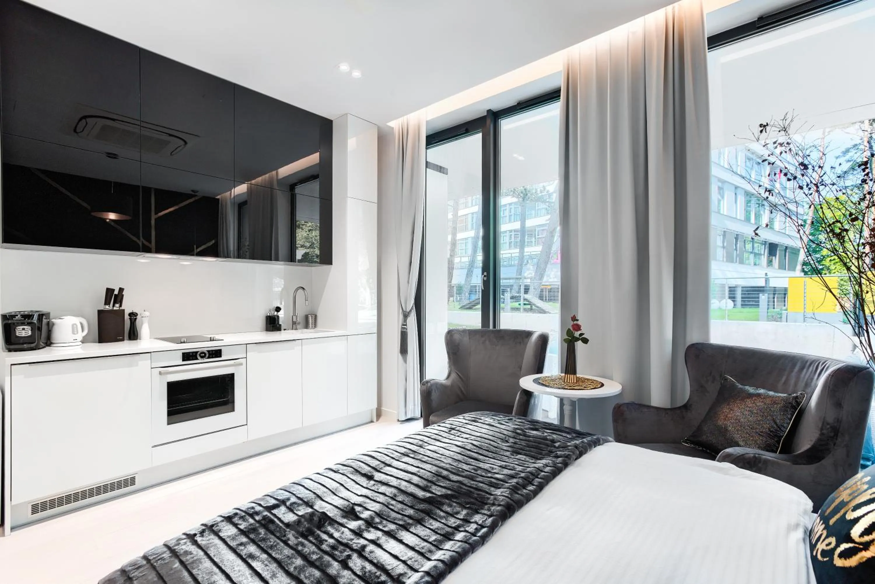 Kitchen or kitchenette, Bed in Dune Beach Resort