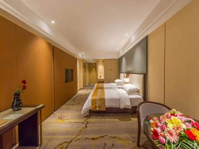 Bed in Vienna International Hotel Diecai Wanda High Speed ​​Rail Station