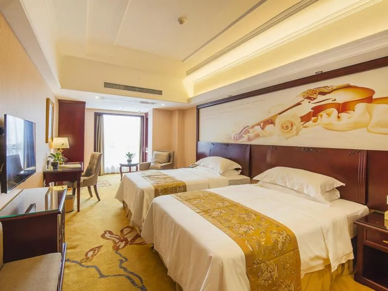 Bed in Vienna Hotel Xi'an International Exihibition Center