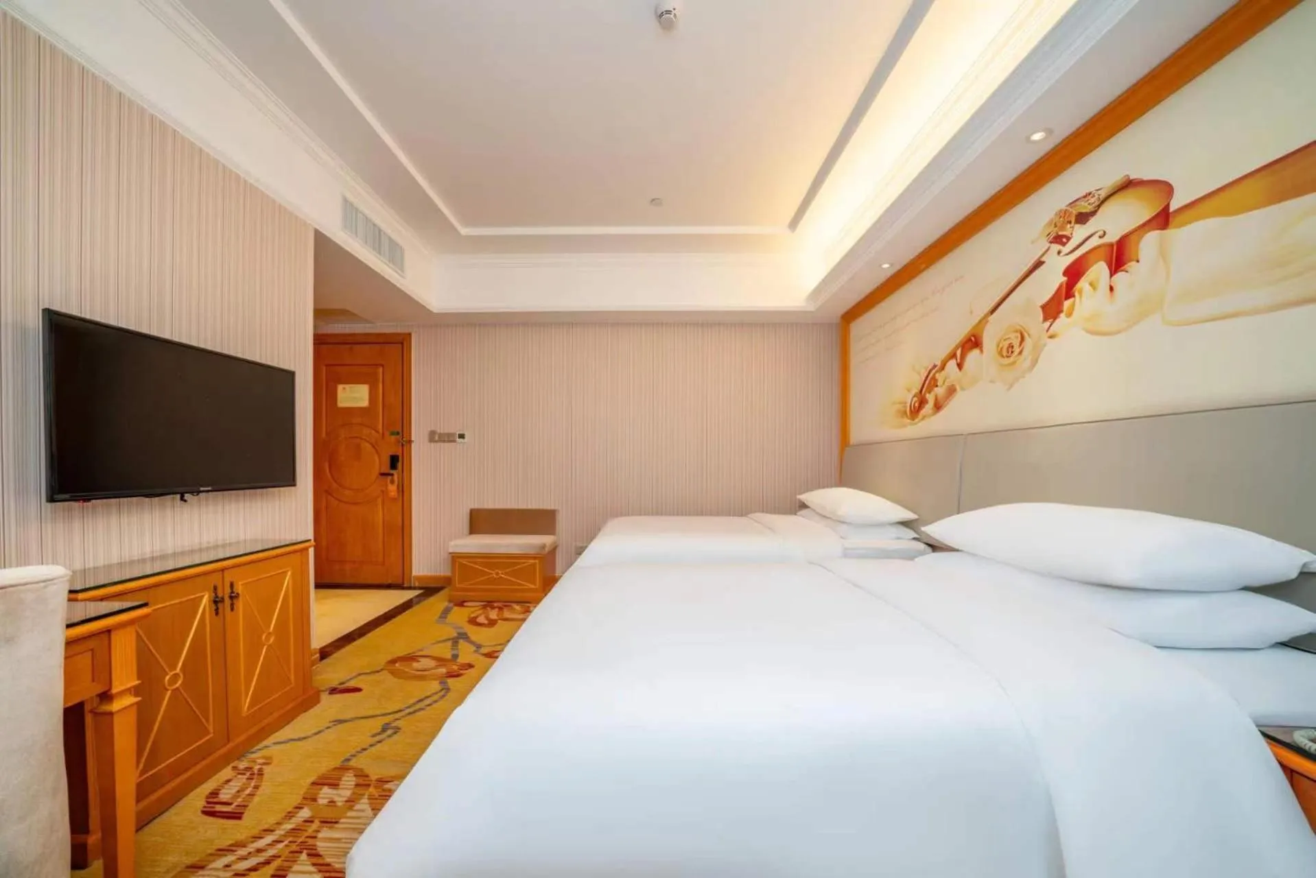 Bed in Vienna Hotel Shenzhen Longshen Subway Station