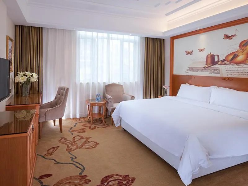 Bed in Vienna Hotel Shenzhen Longshen Subway Station