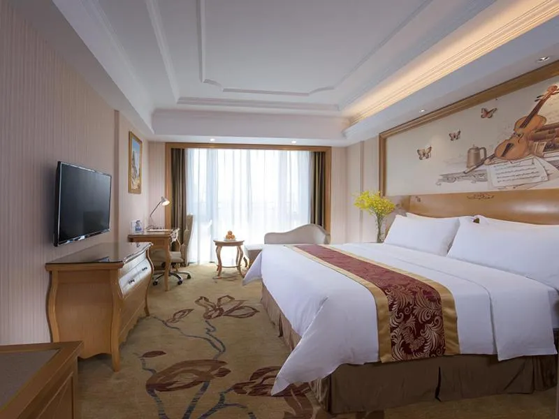 Bed in Vienna International Hotel Foshan Beijiao New City Meidi Headquarter