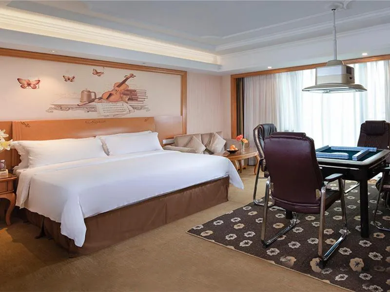 Bed in Vienna International Hotel Foshan Beijiao New City Meidi Headquarter