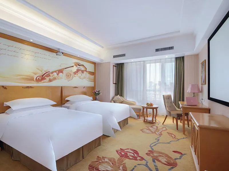 Bed in Vienna Hotel Shandong Qingdao Chengyang