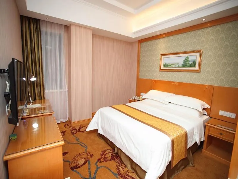 Bed in Vienna Hotel Jiangsu Kunshan Exhibition Center