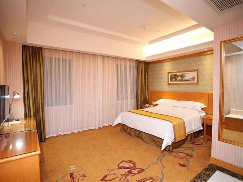 Bed in Vienna Hotel Jiangsu Kunshan Exhibition Center